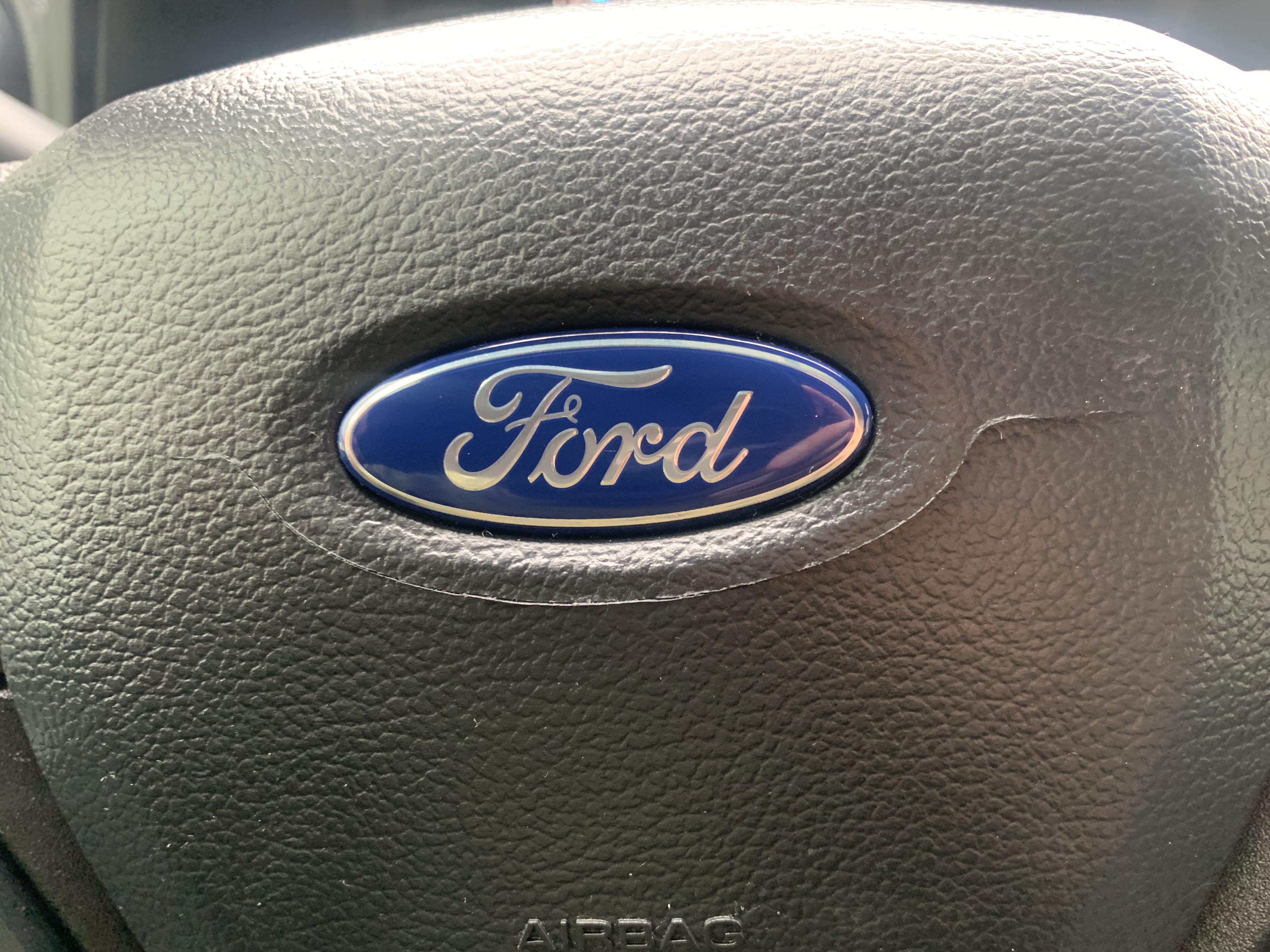 Steering wheel emblem causing leather cracking. Any thoughts? r/f150