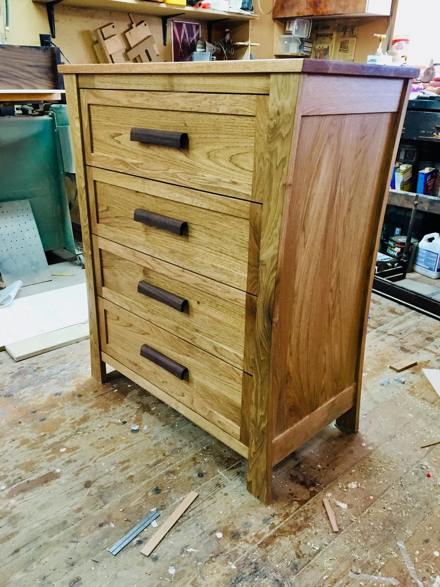 Butternut dresser with Walnut pulls. r/woodworking