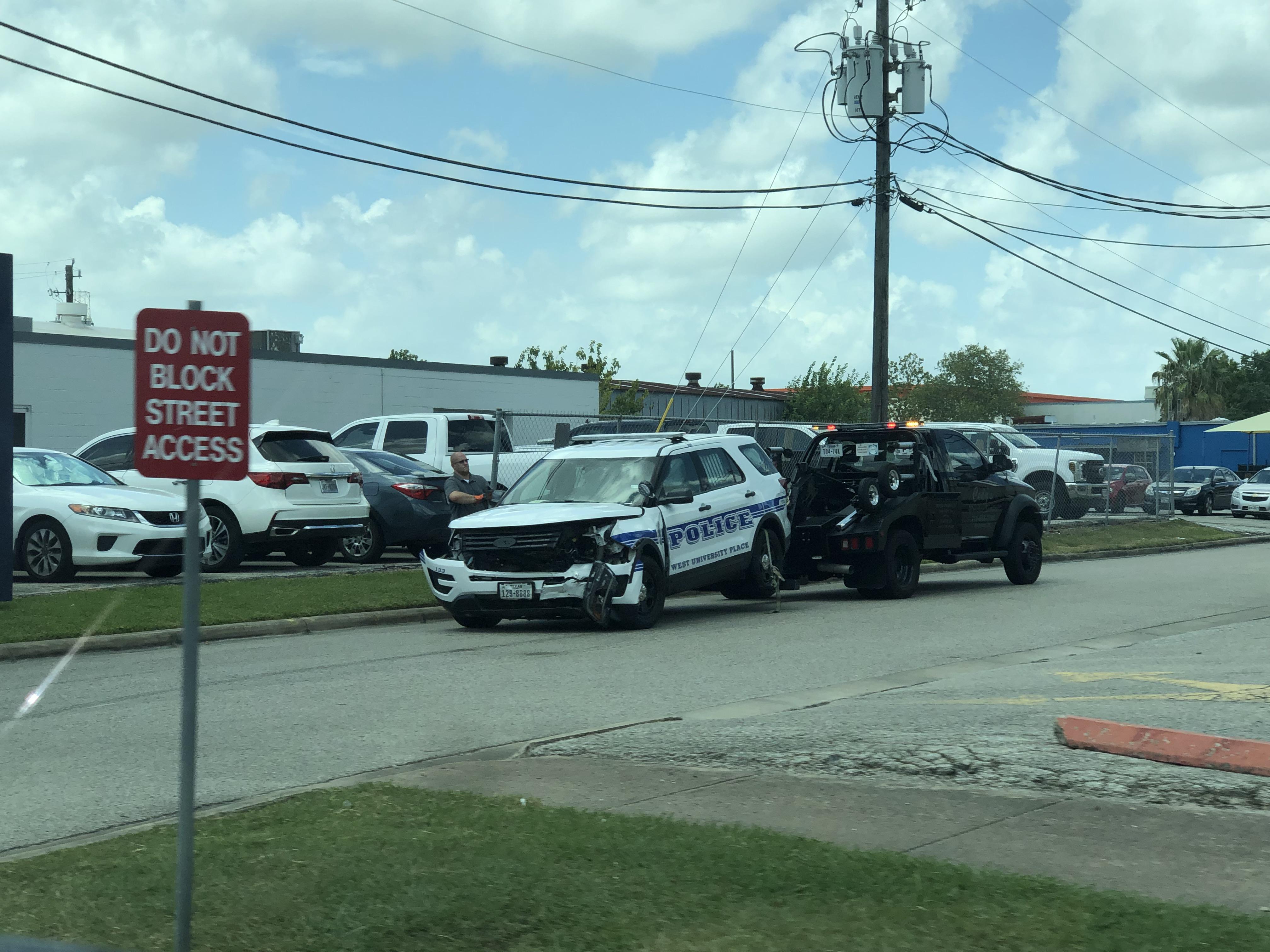 West University Police Unit involved in head on collision at S Rice Ave