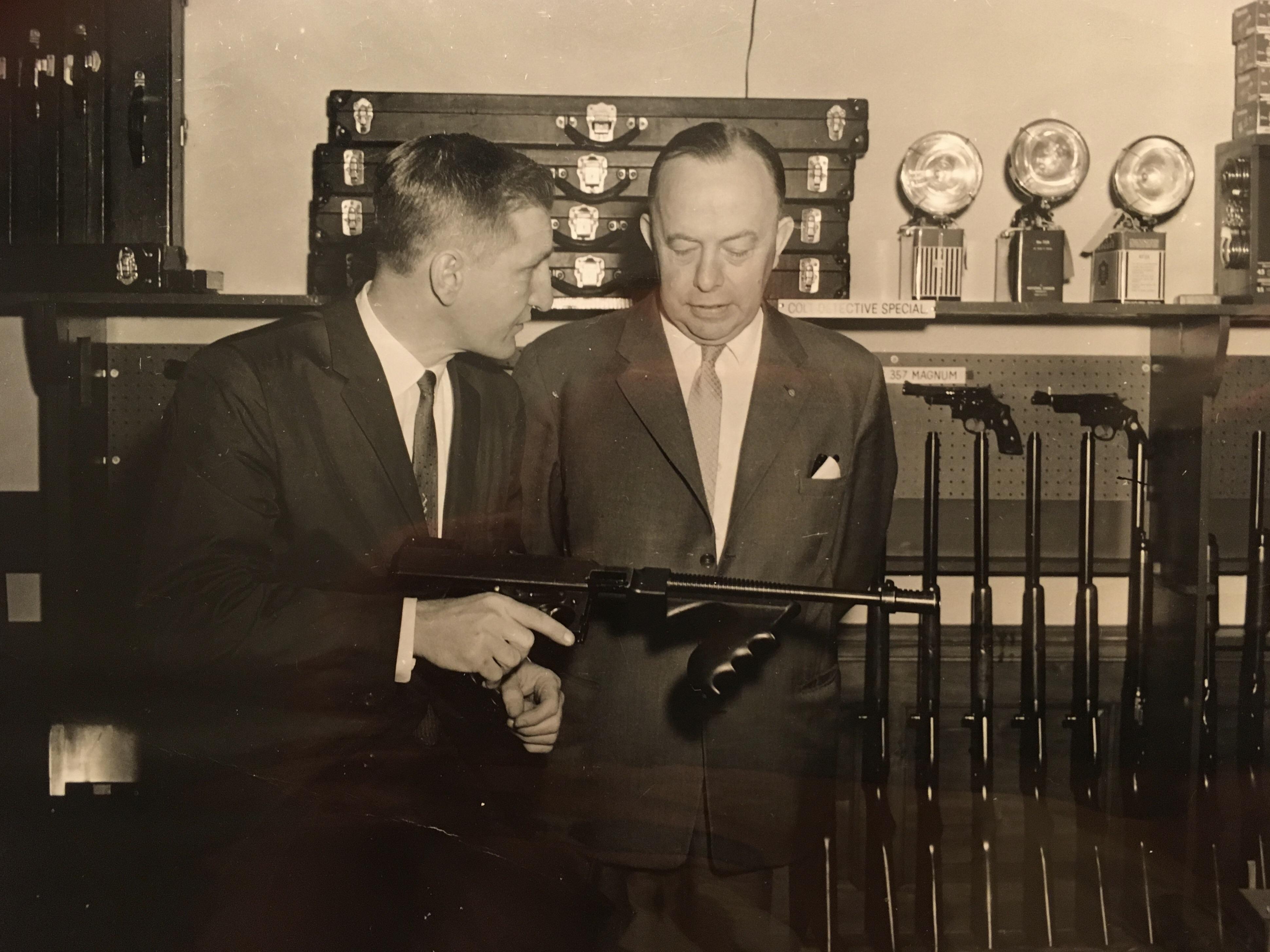 My grandfather, an FBI Special Agent, showing off the arsenal in the