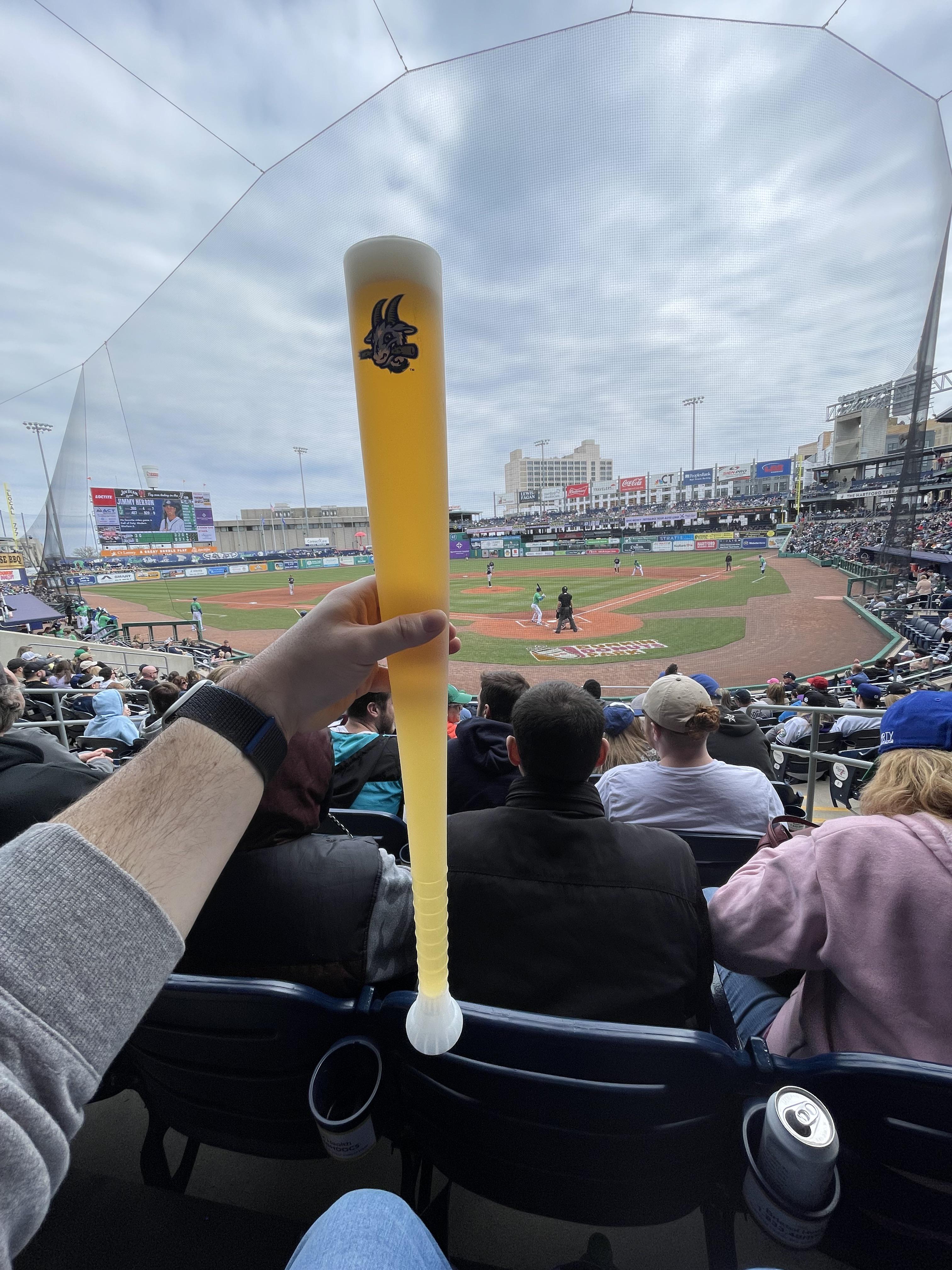 A baseball bat full of beer at the Hartford Yard Goats game baseball
