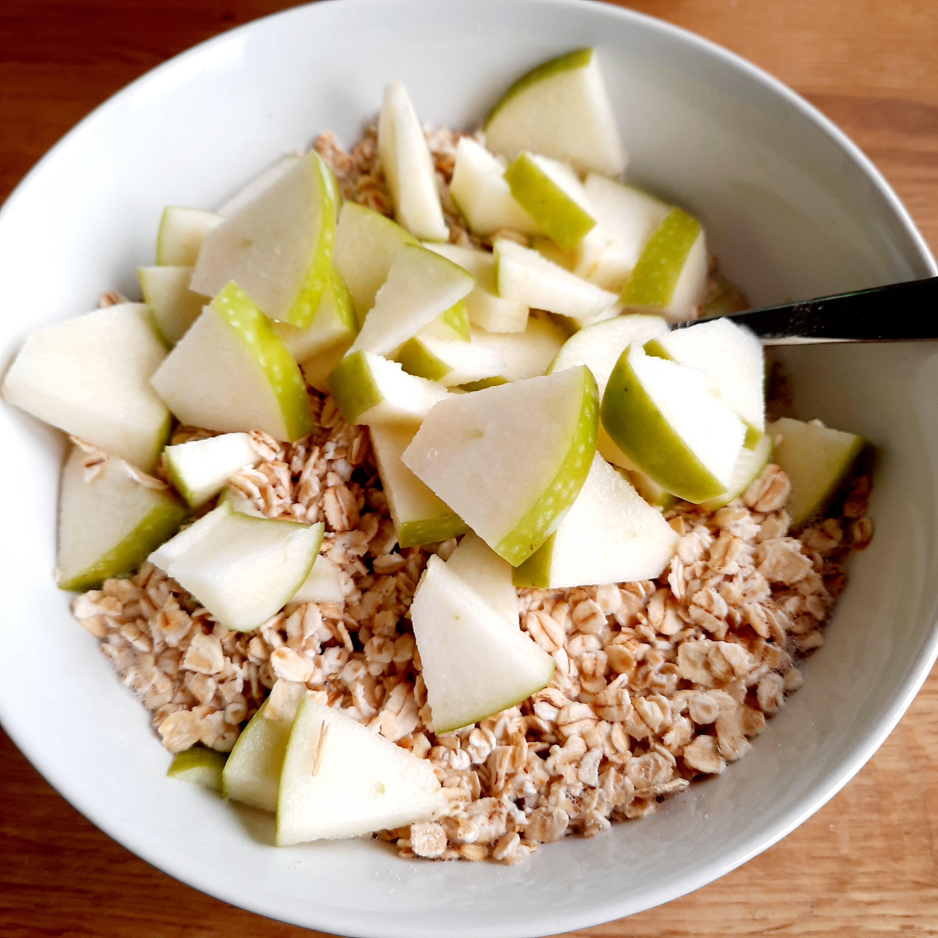 My daily break fast. Oats, apple, a spoon of protein powder and oat