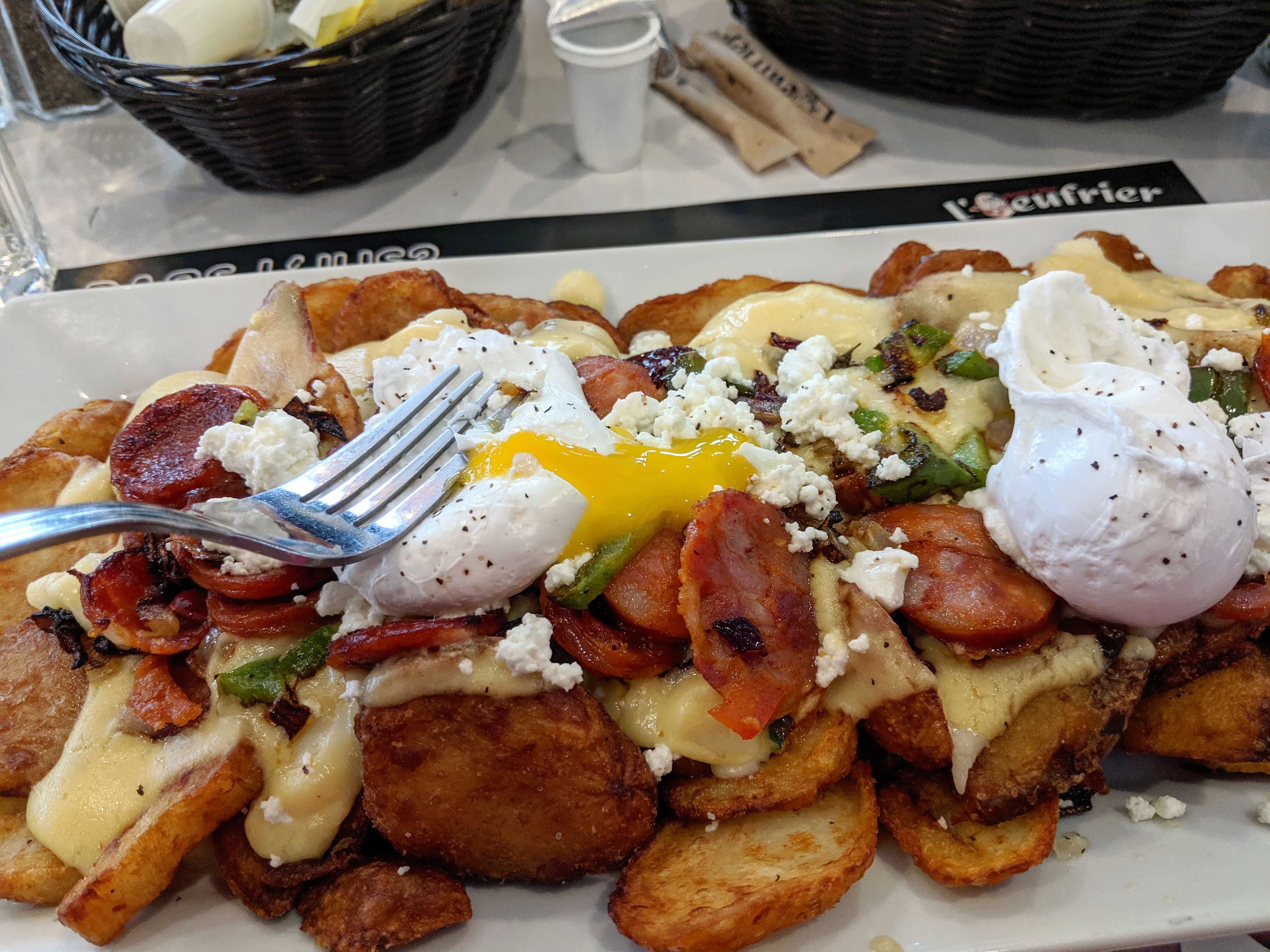 [I ate] Monstrous breakfast poutine cottage fries, chorizo, bacon