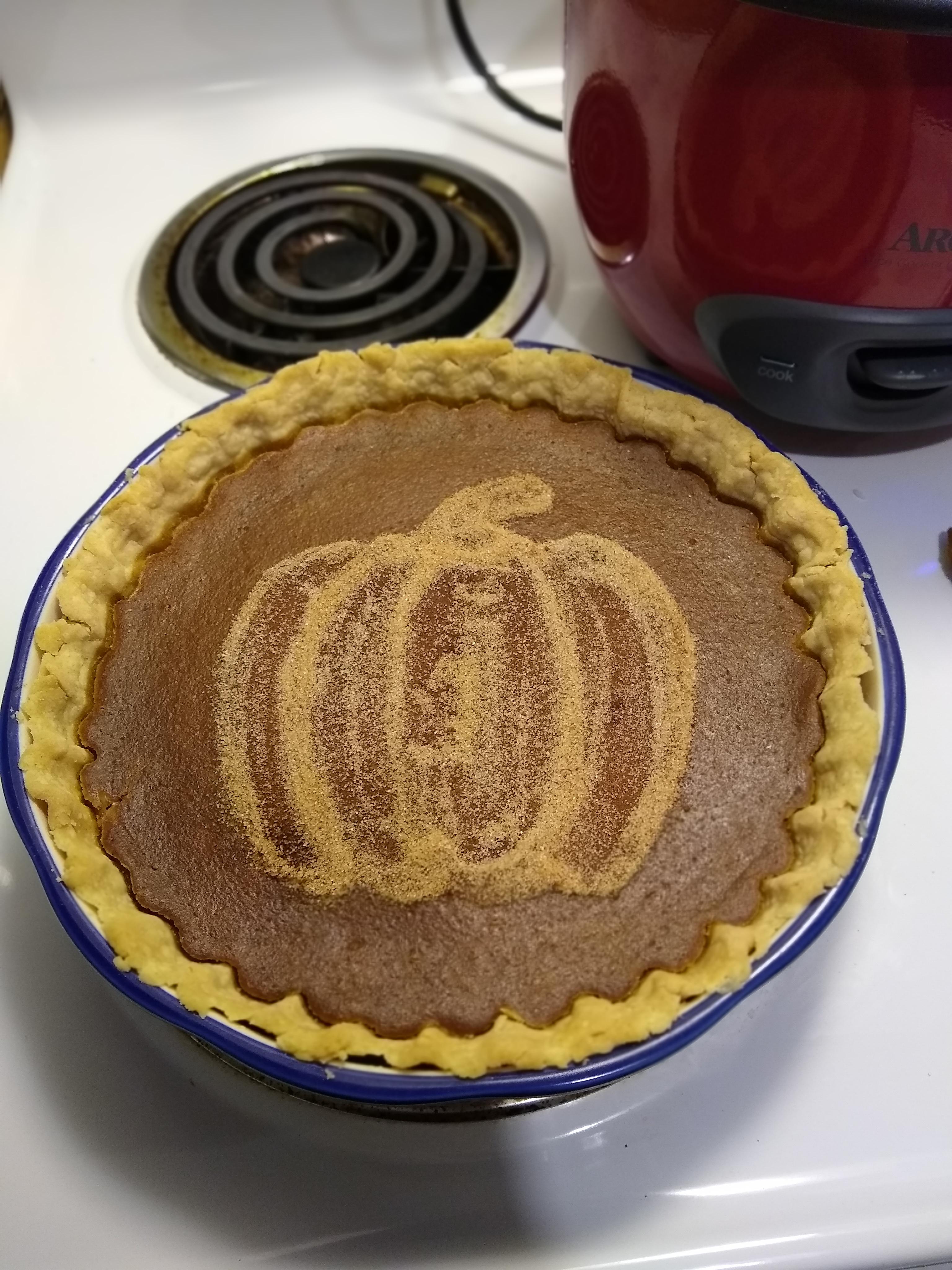 Vegan pumpkin pie with gluten free crust and cinnamonsugar topping