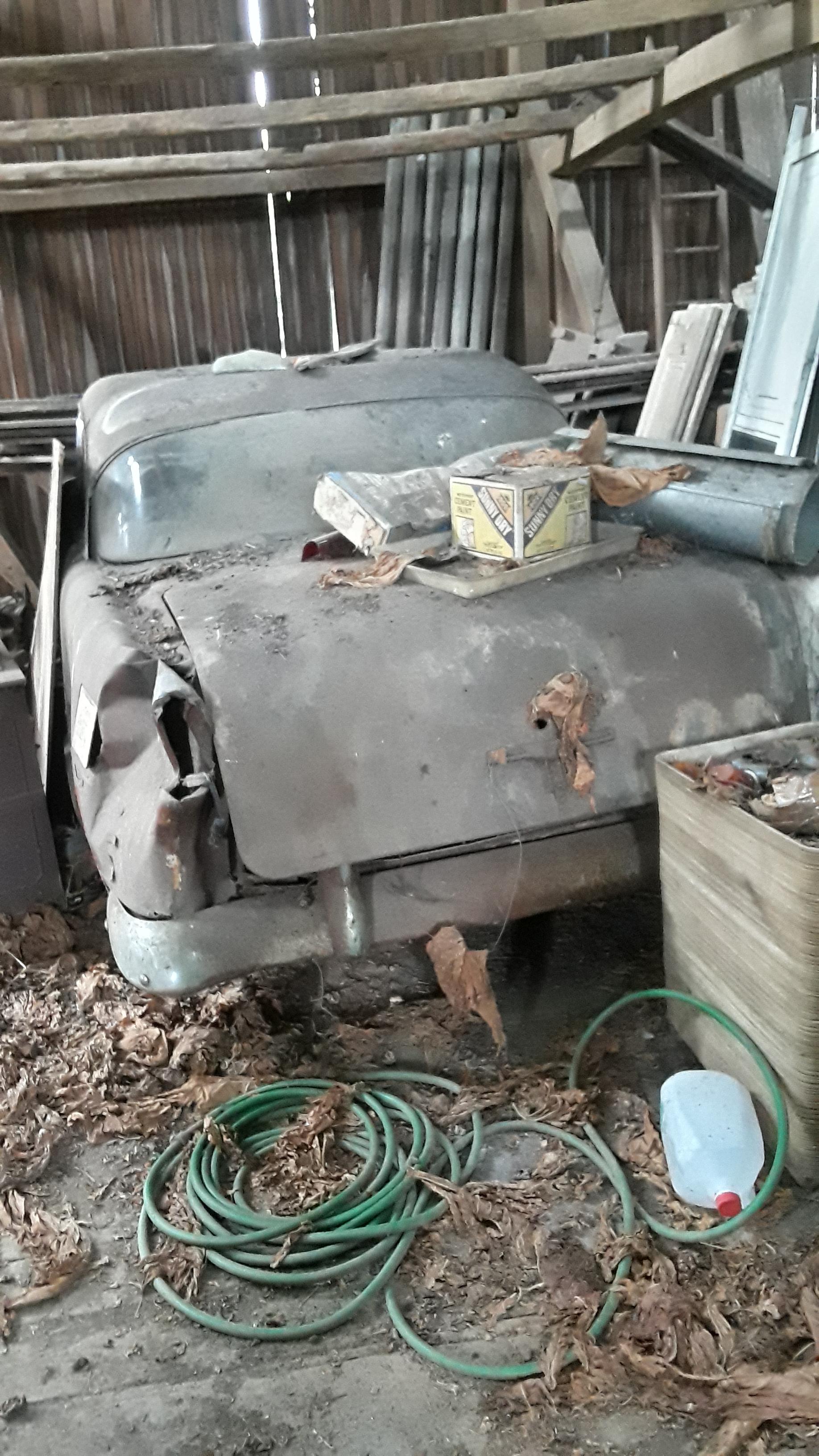 Old car inside abandoned barn, in PA r/AbandonedPorn