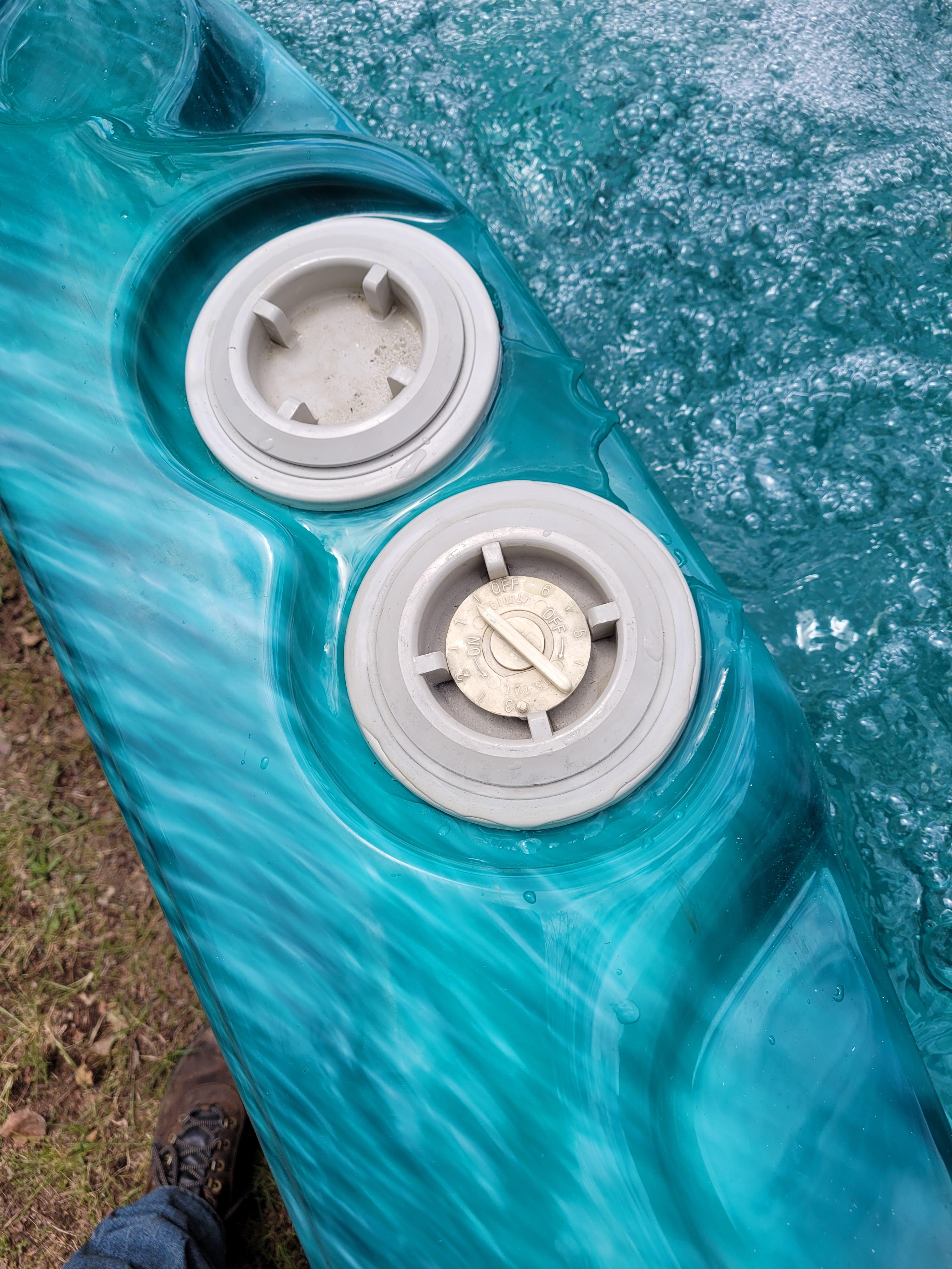 New used hot tub, leaking out of the right dial looking thing, can