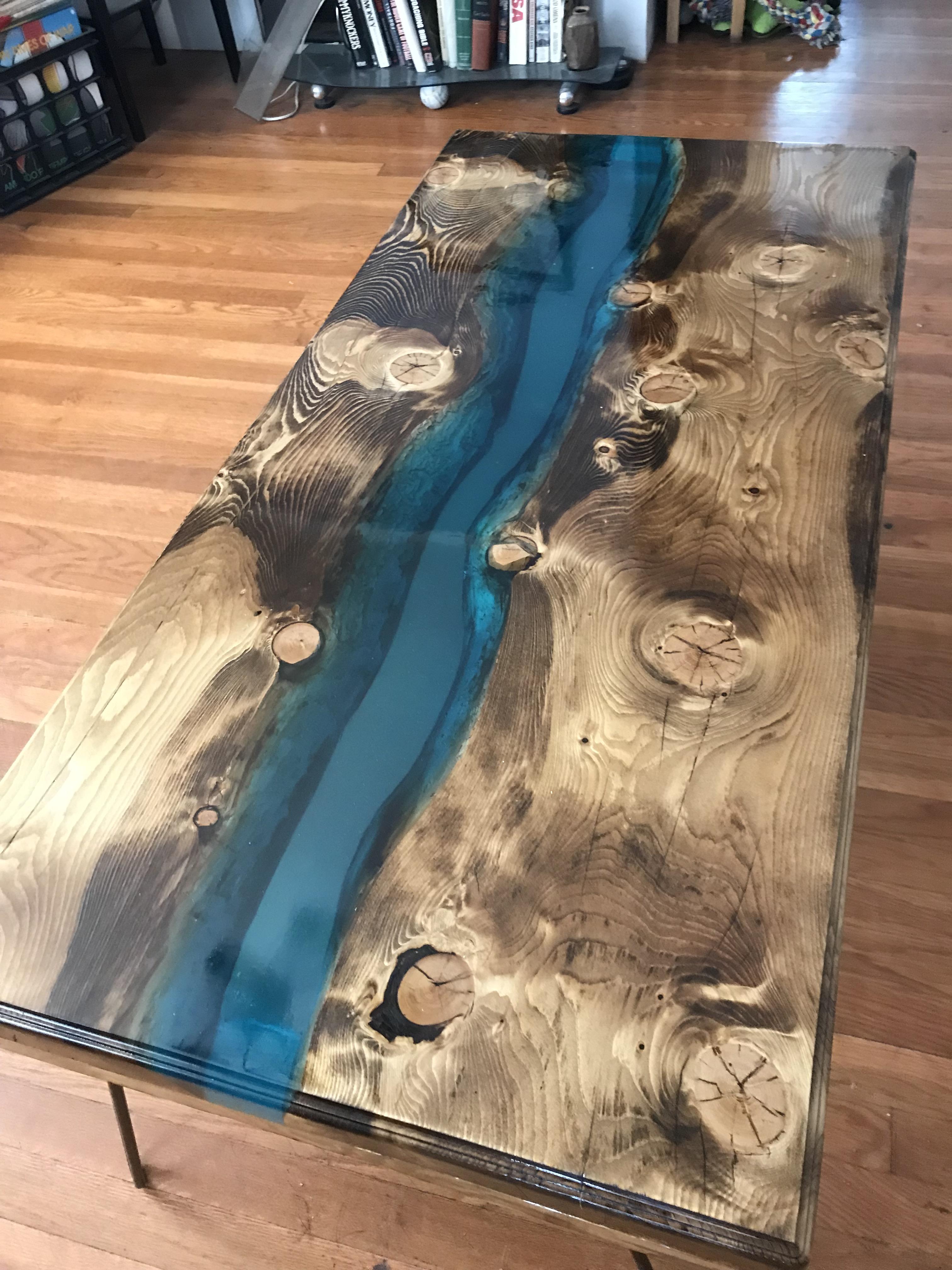 My first river table (also my first post) more pics in comments r/woodworking