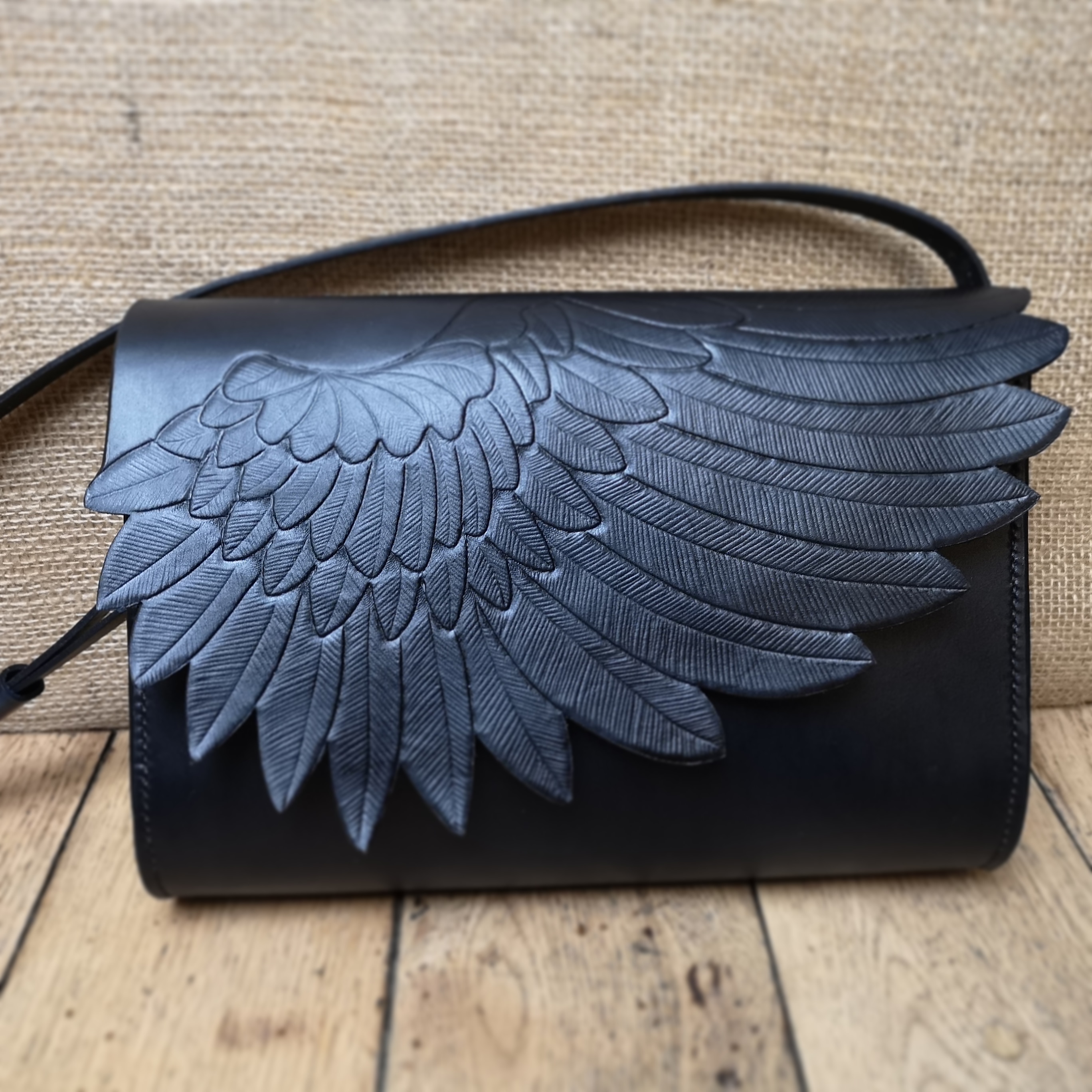 My newest commission. The raven wing bag. r/leatherwork
