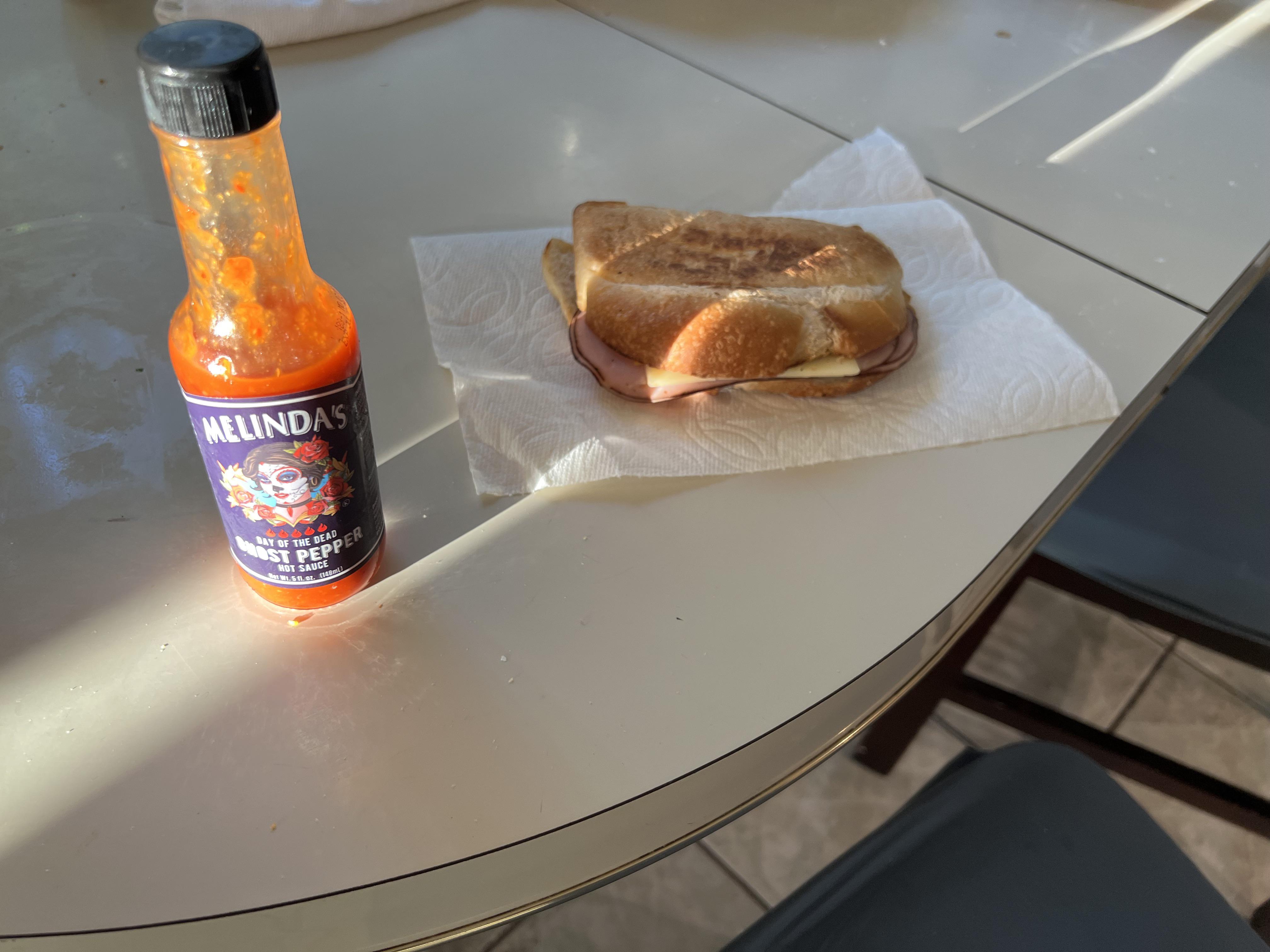 Ham and cheese with entirely too much hot sauce. I am going to die. r