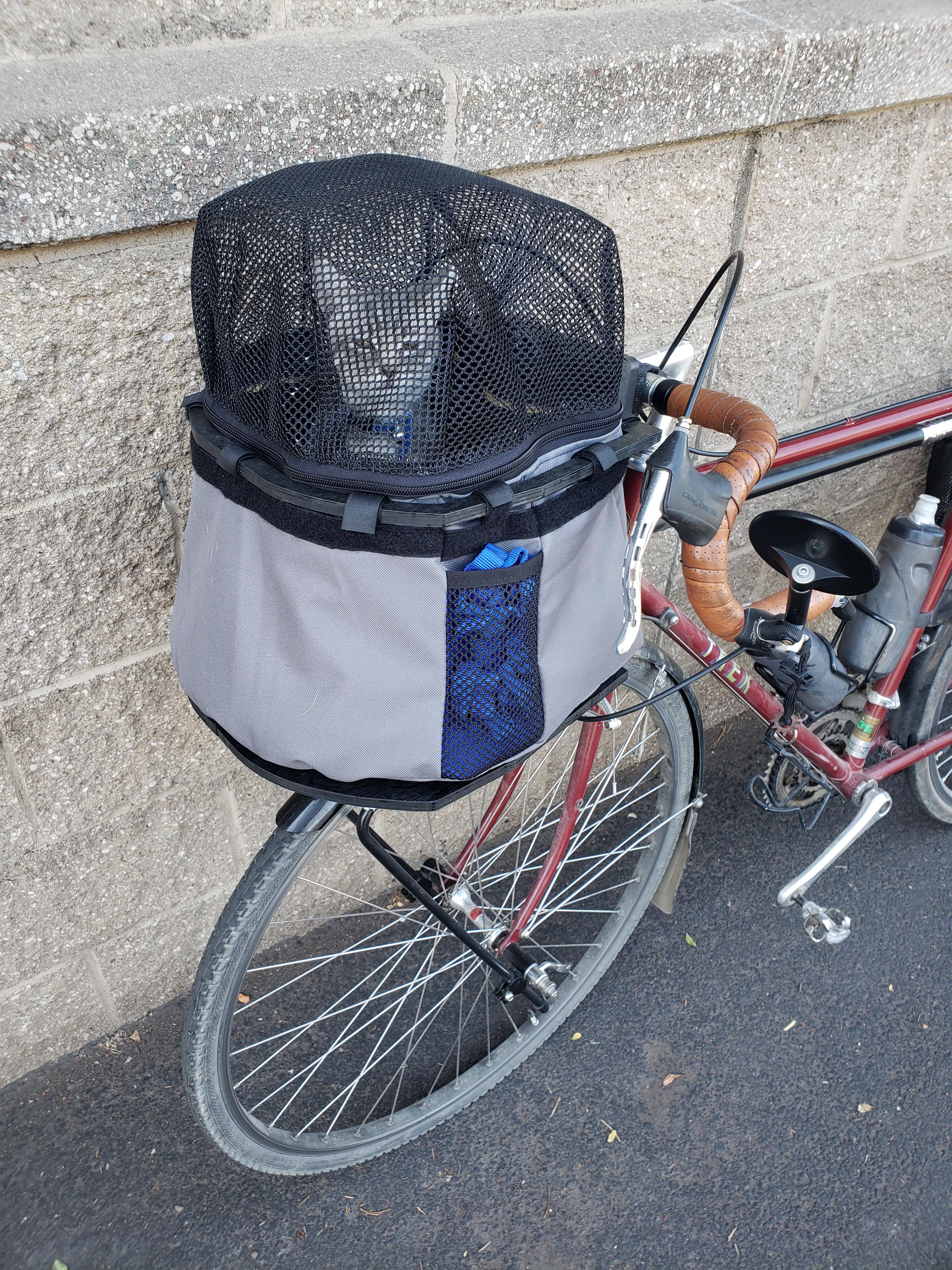 Kitty carrier for my bicycle. Top zips open for quiet trails and a
