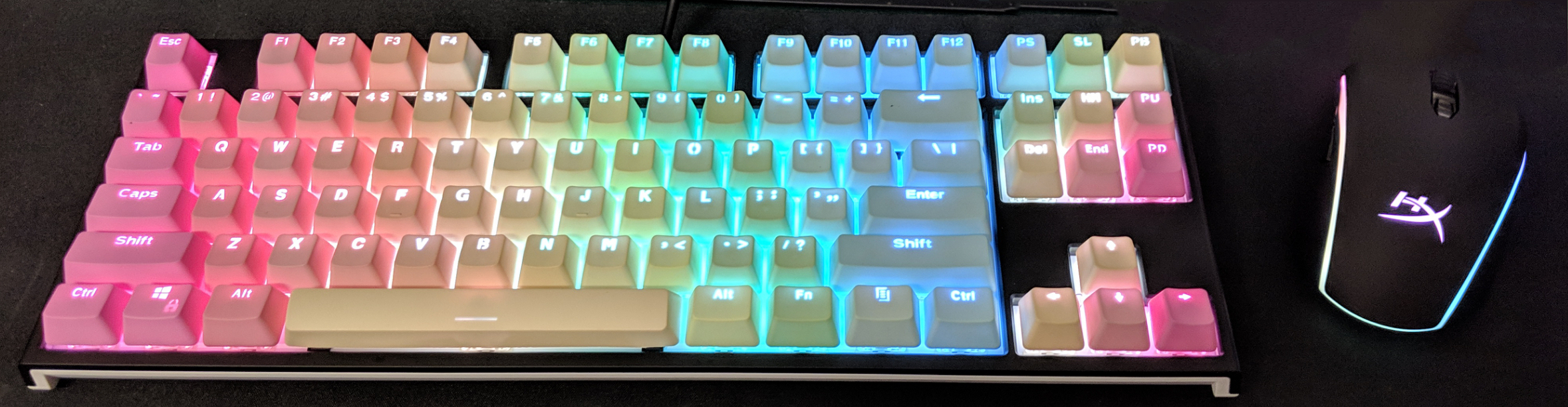 My first mechanical keyboard with pastel rainbow keycaps I'm in love