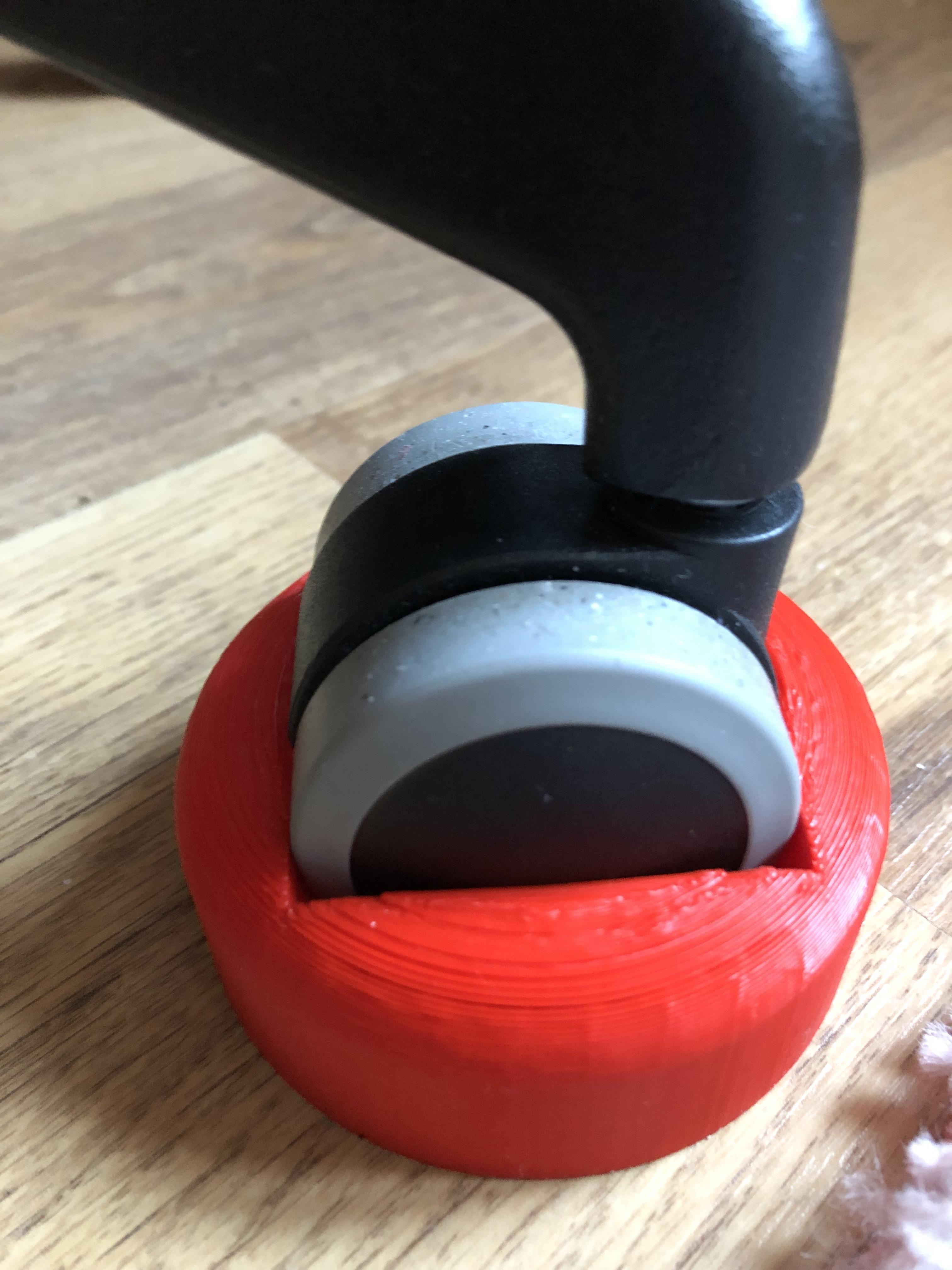 I designed and printed this so that my office chair wont roll away