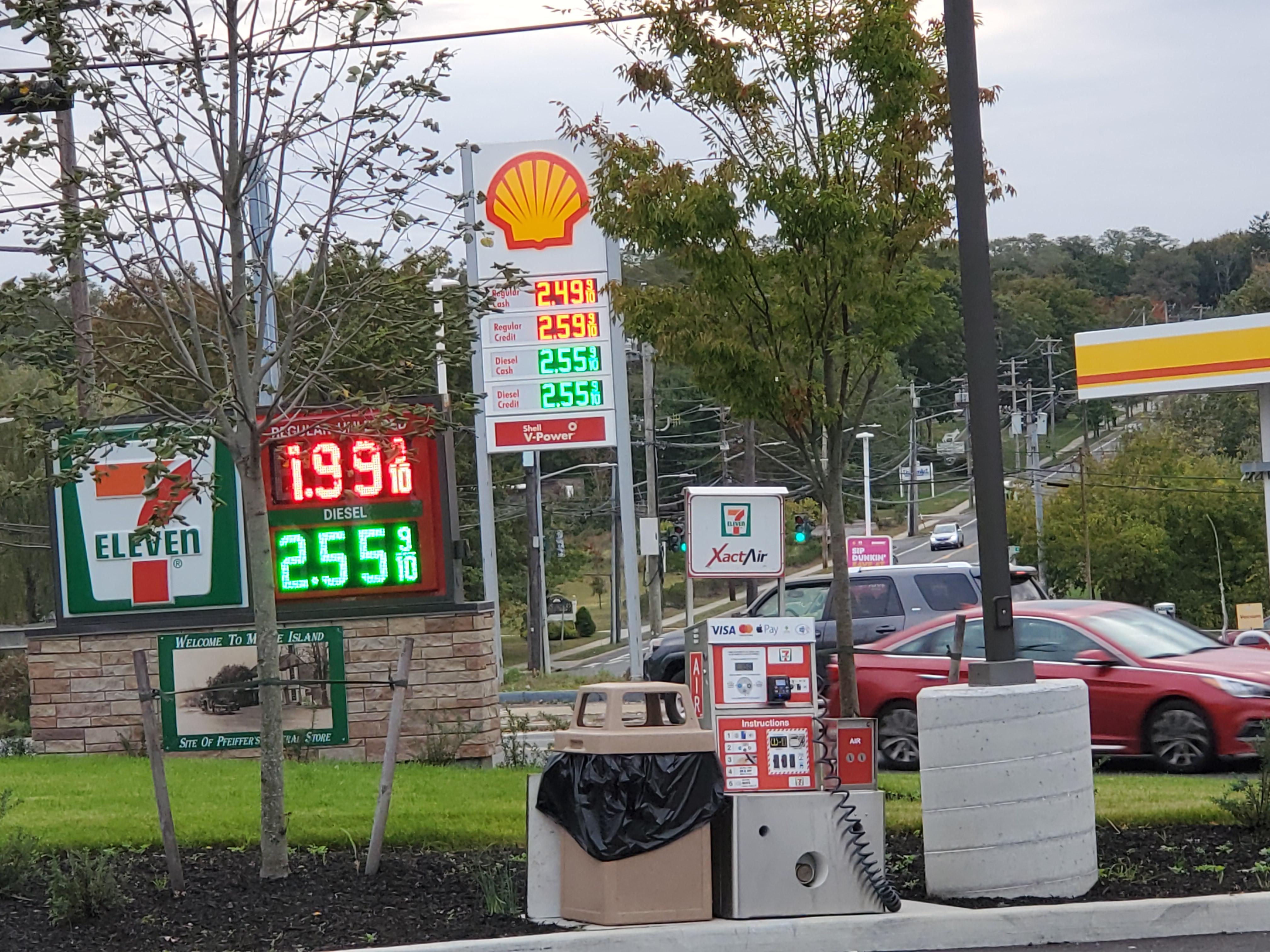 The gas station across the street has business despite the massive