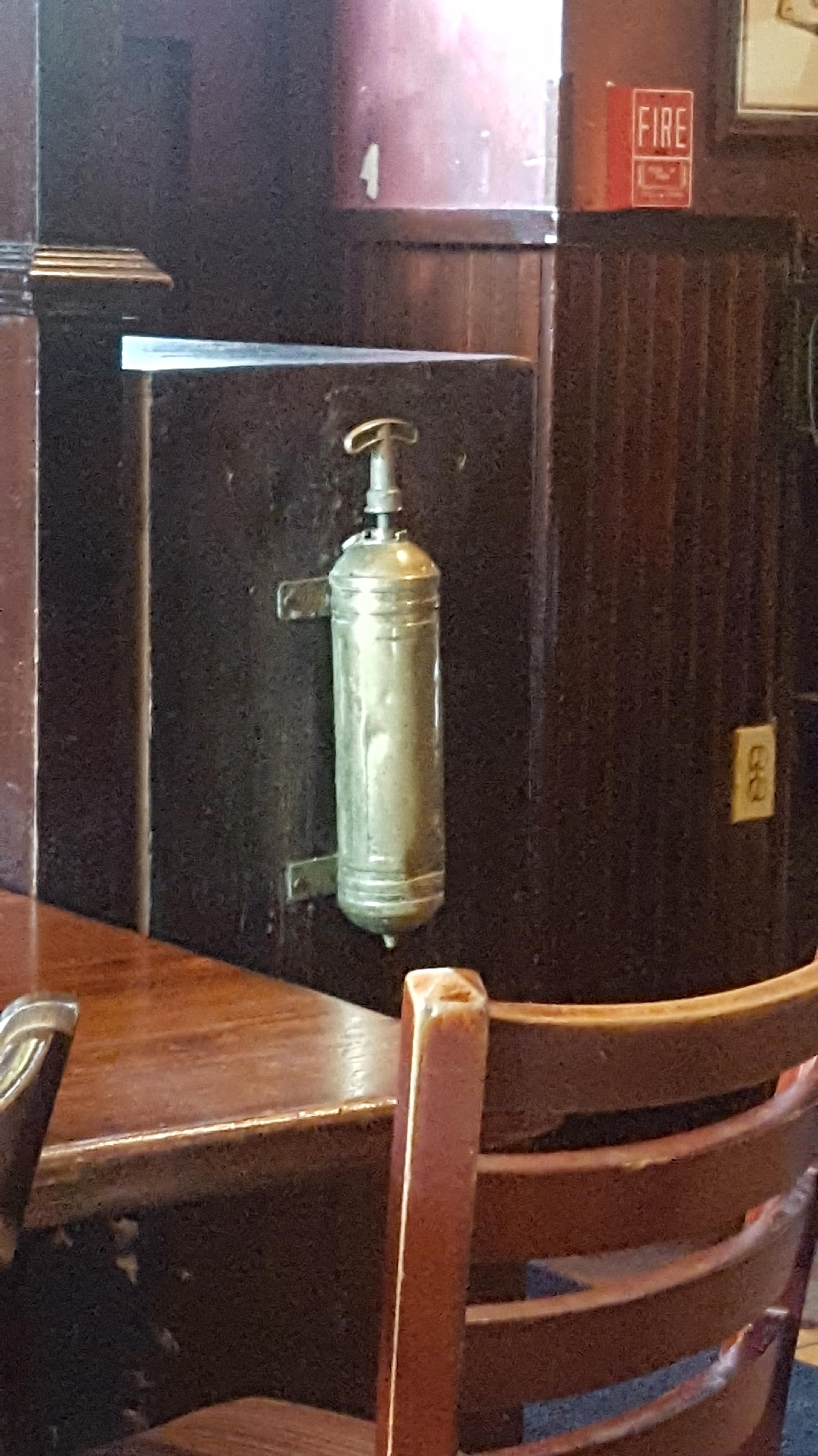 Found at an Irish pub. Some kinda old fire extinguisher? r
