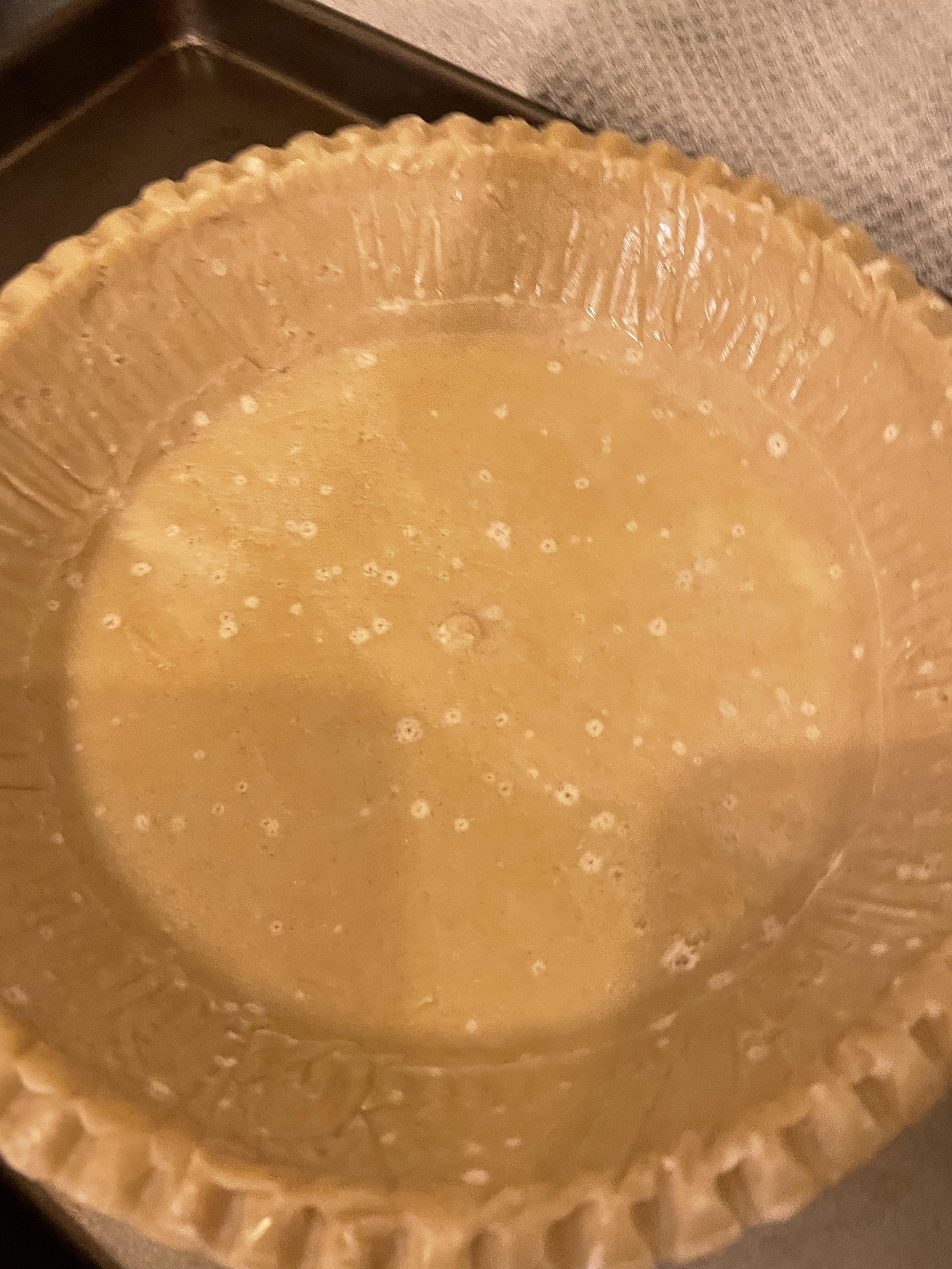 Are the white spots on this uncooked prepackaged pie crust normal? Or
