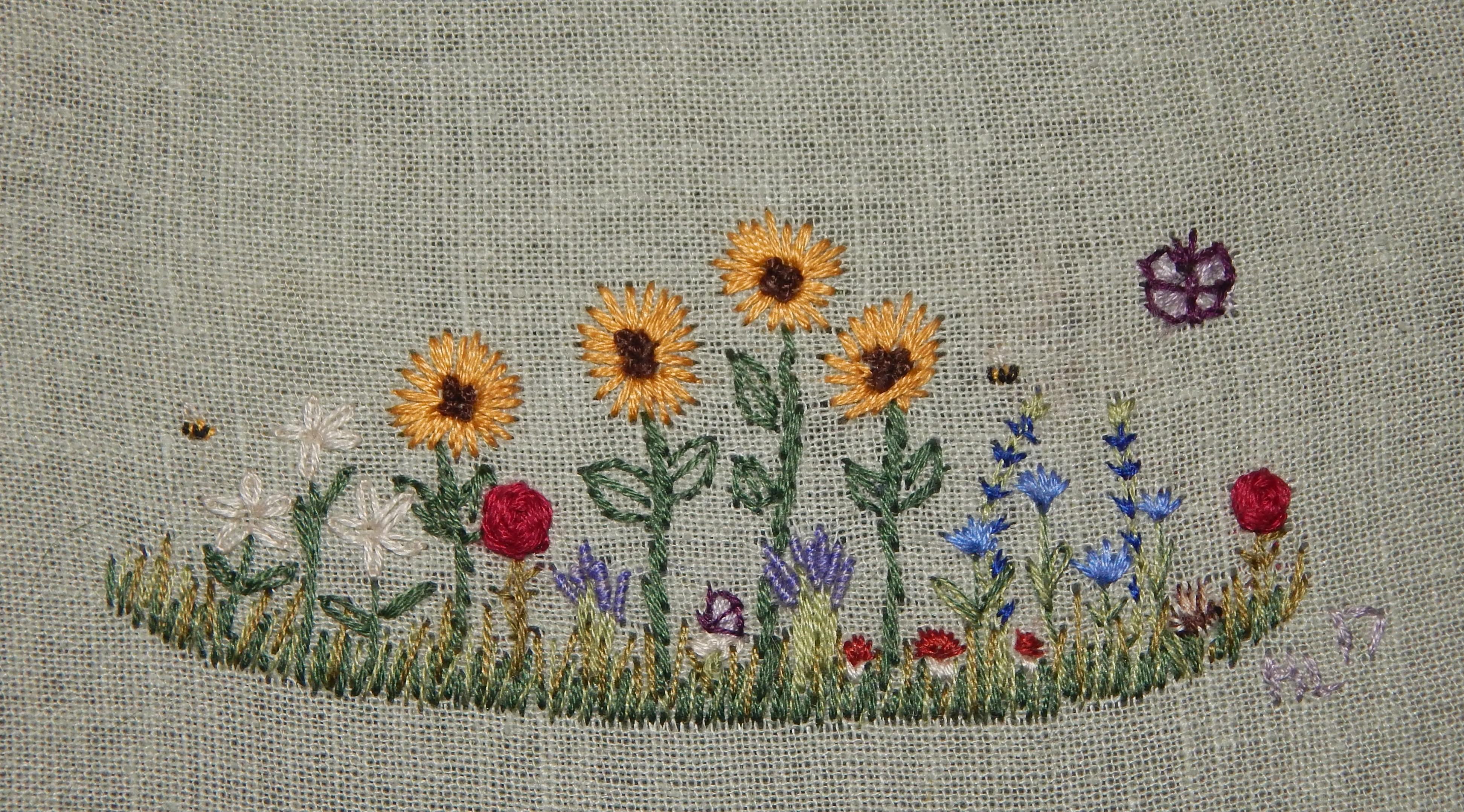 A little flower garden doodle, with butterflies, bees, and a tiny