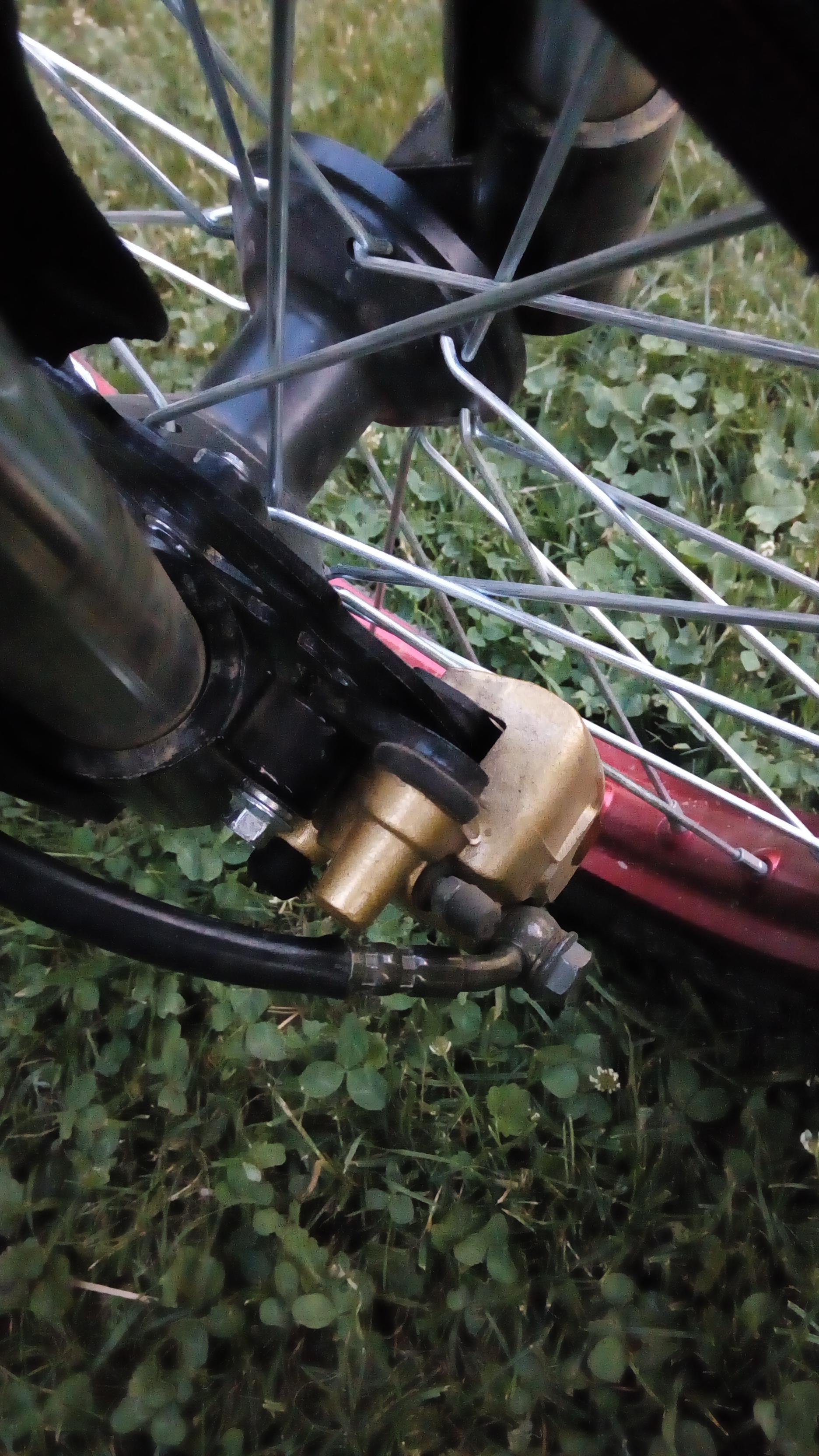 Hello, can someone please help me? My brakes are griding slightly