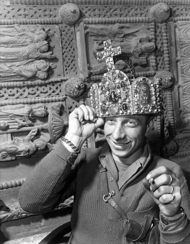 GI wearing the crown of the Holy Roman Empire in a cave in Siegen