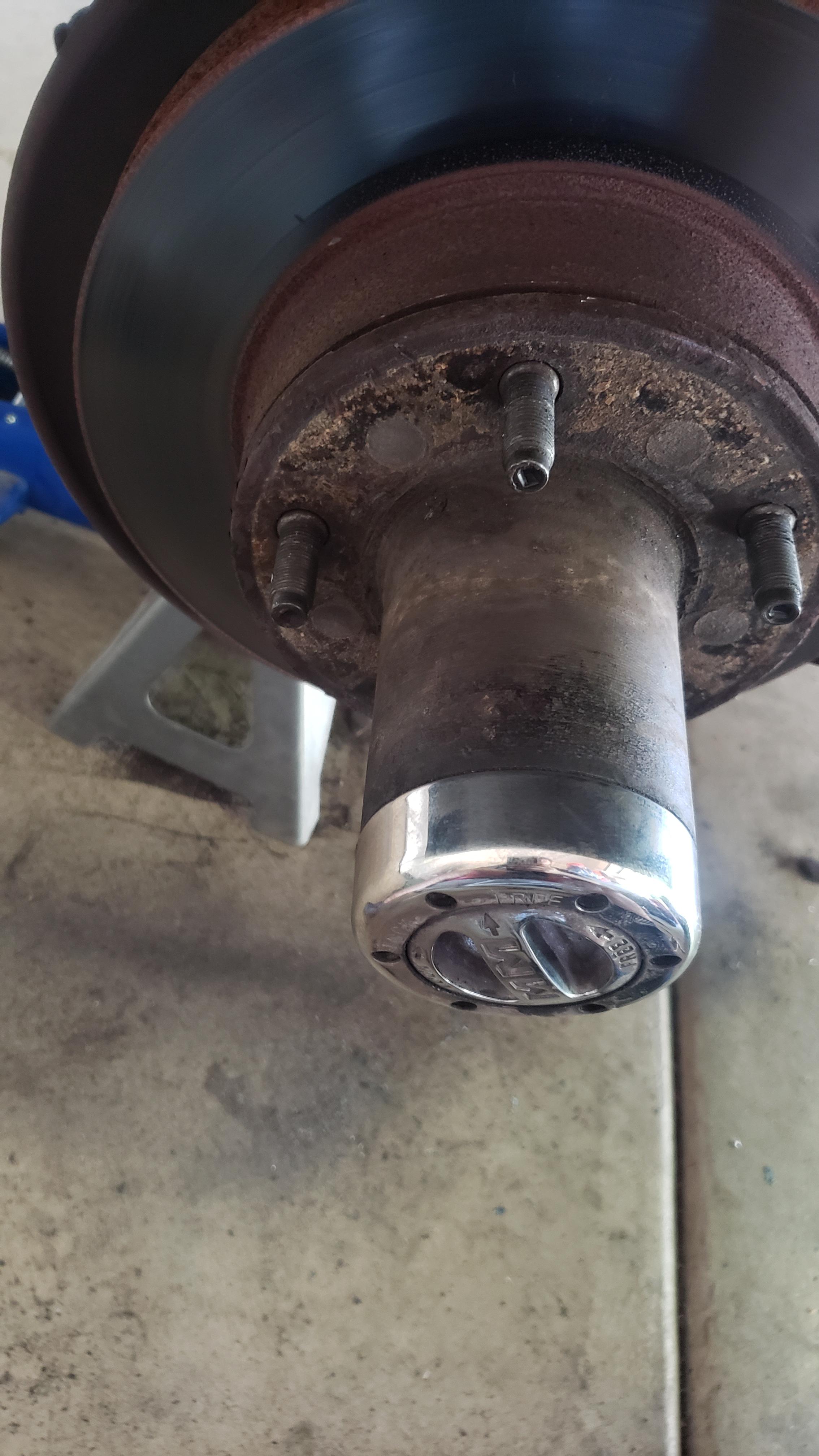 The cover for the bearing is rusted on, any ideas how to get it off