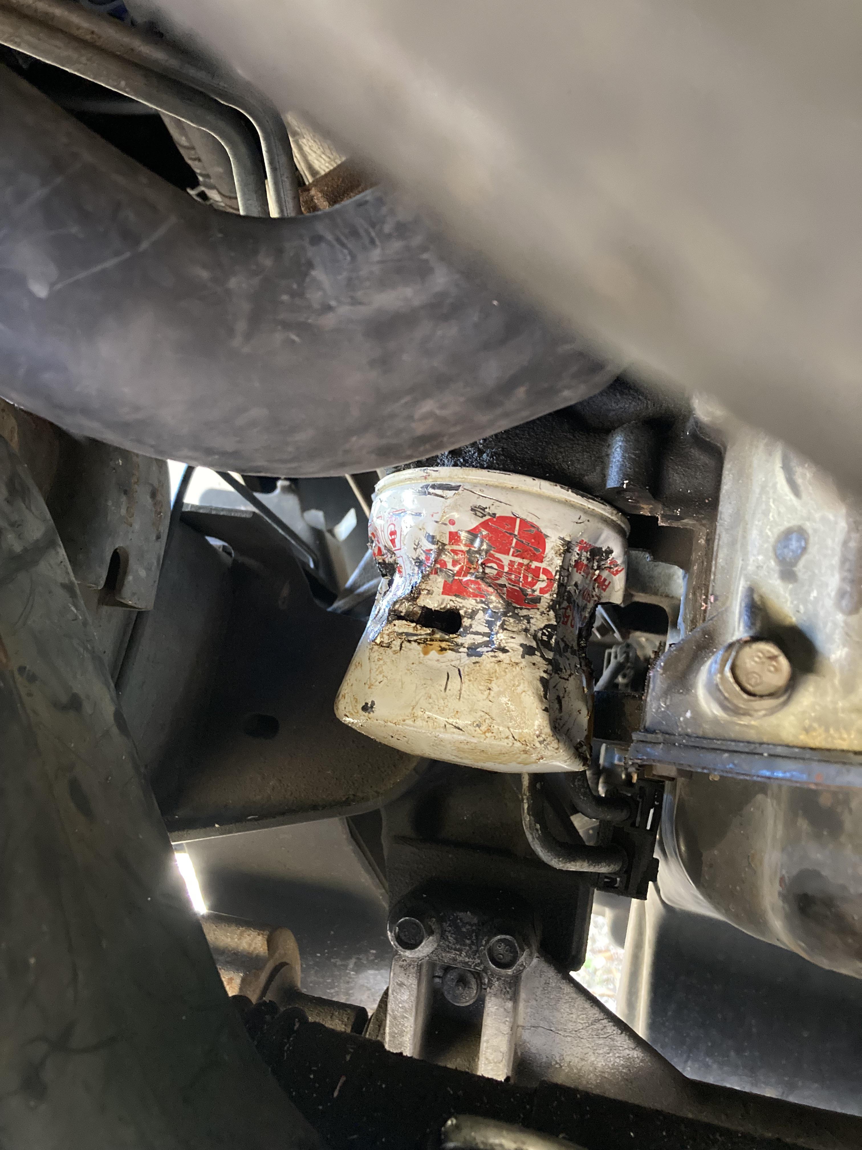 Seized oil filter, any ideas? Screwdriver not working : r/MechanicAdvice