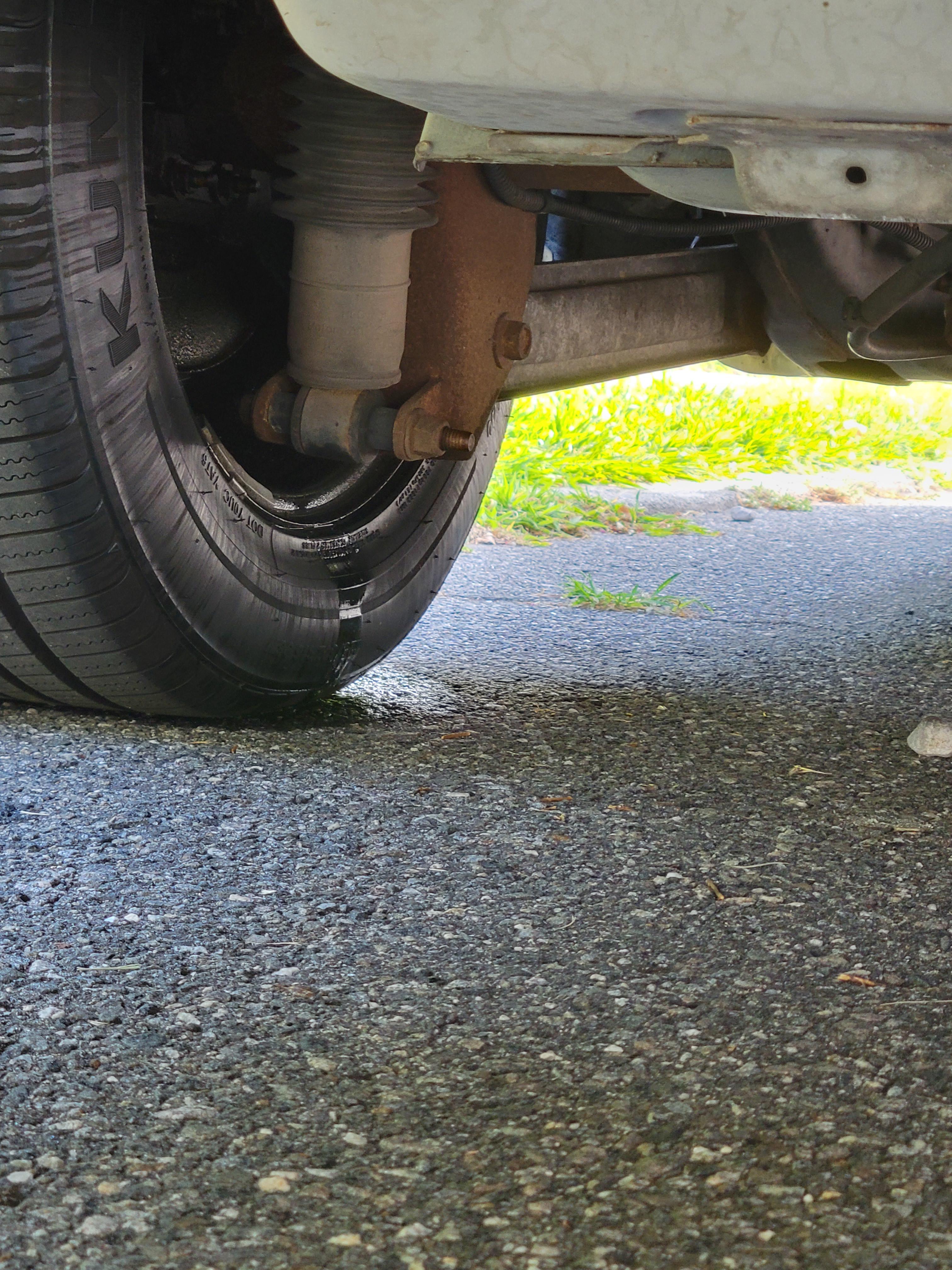 Coolant leak from driver's side rear tire. How messed up am I? r