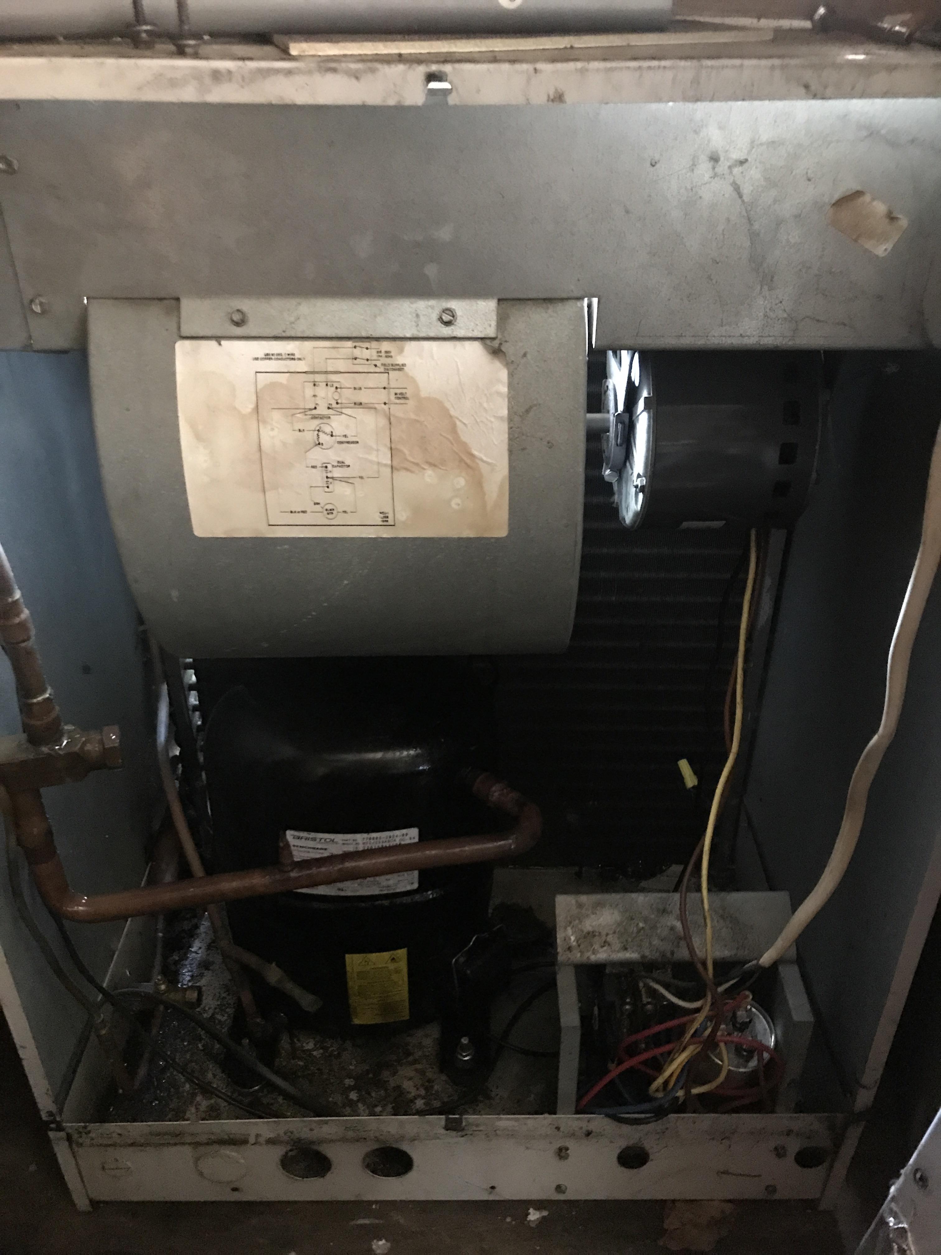 Through the wall condenser unit. Hilarious that someone rigged a blower