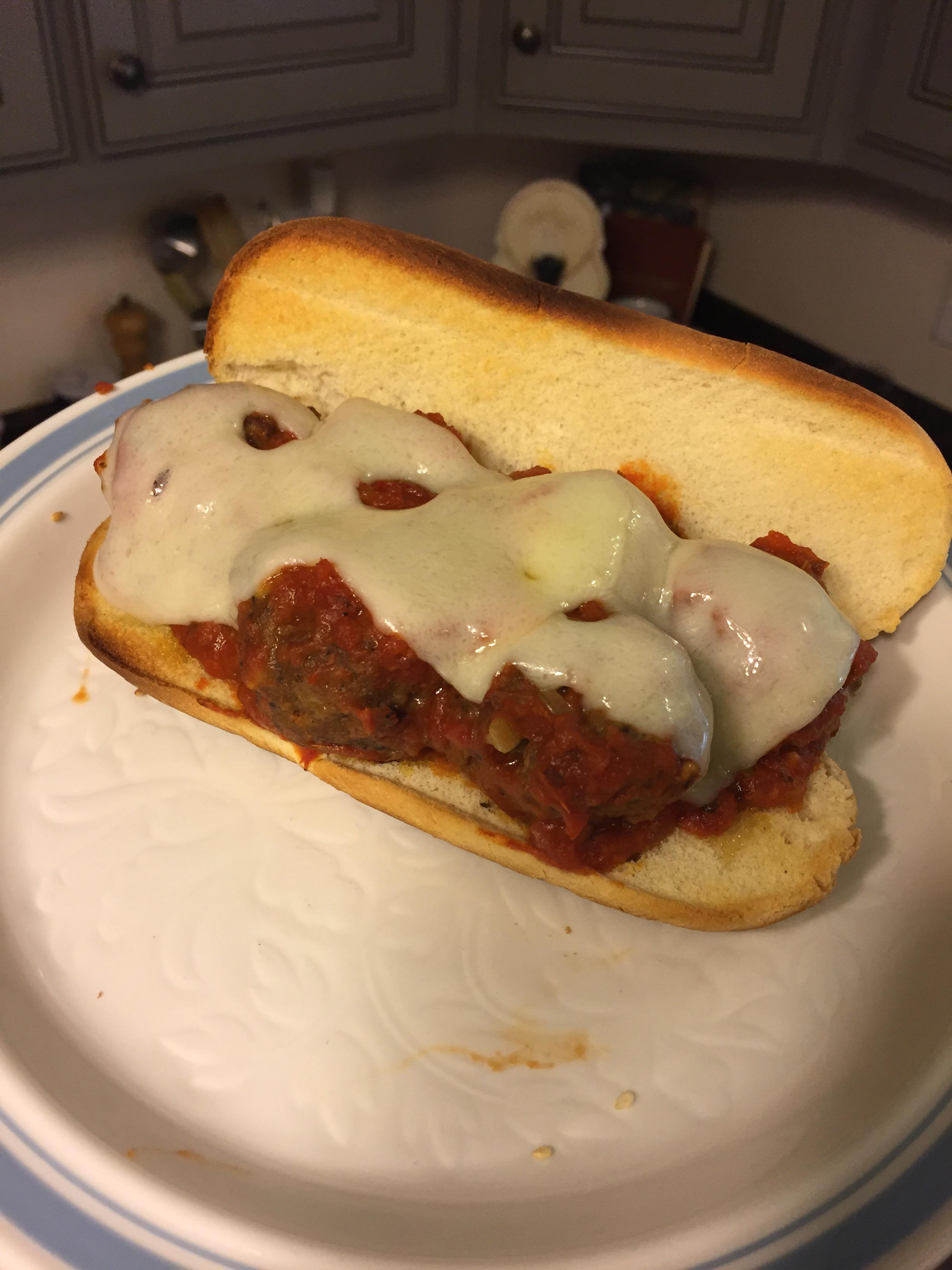 Homemade meatball sub with melted Swiss on top. r/eatsandwiches