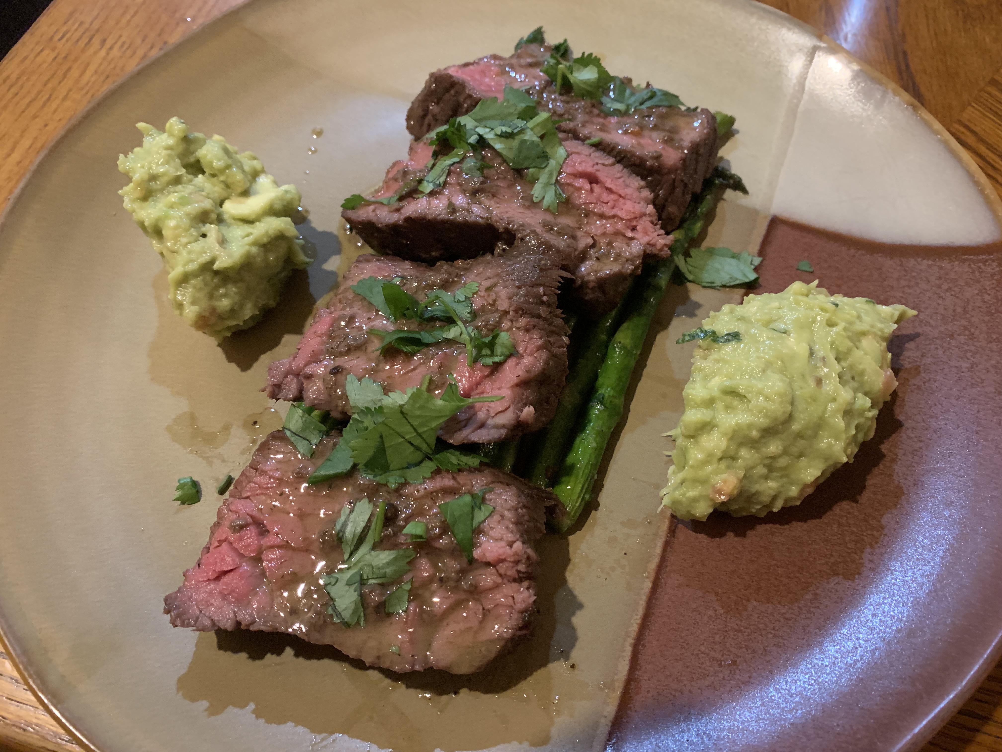 Back on it. Sirloin flap steak with asparagus, guac, butter ban sauce