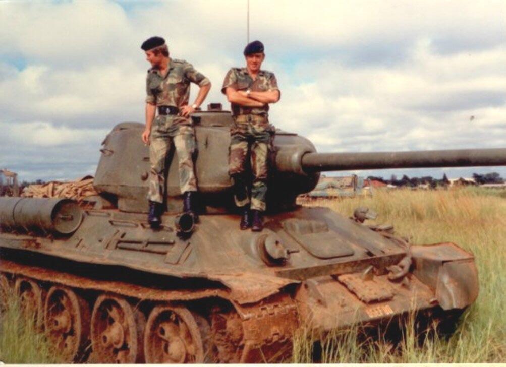 Rhodesian Soldiers with a Captured Zimbabwe People's Revolutionary Army T34 tank during the