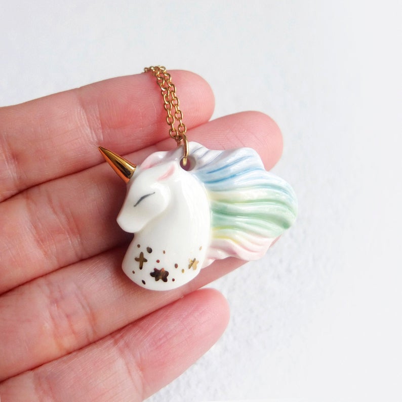 I made a unicorn necklace porcelain hand painted comes with 18" gold