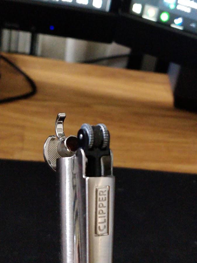 Help! I'm new to clipper lighters and my flint seems to be stuck. r
