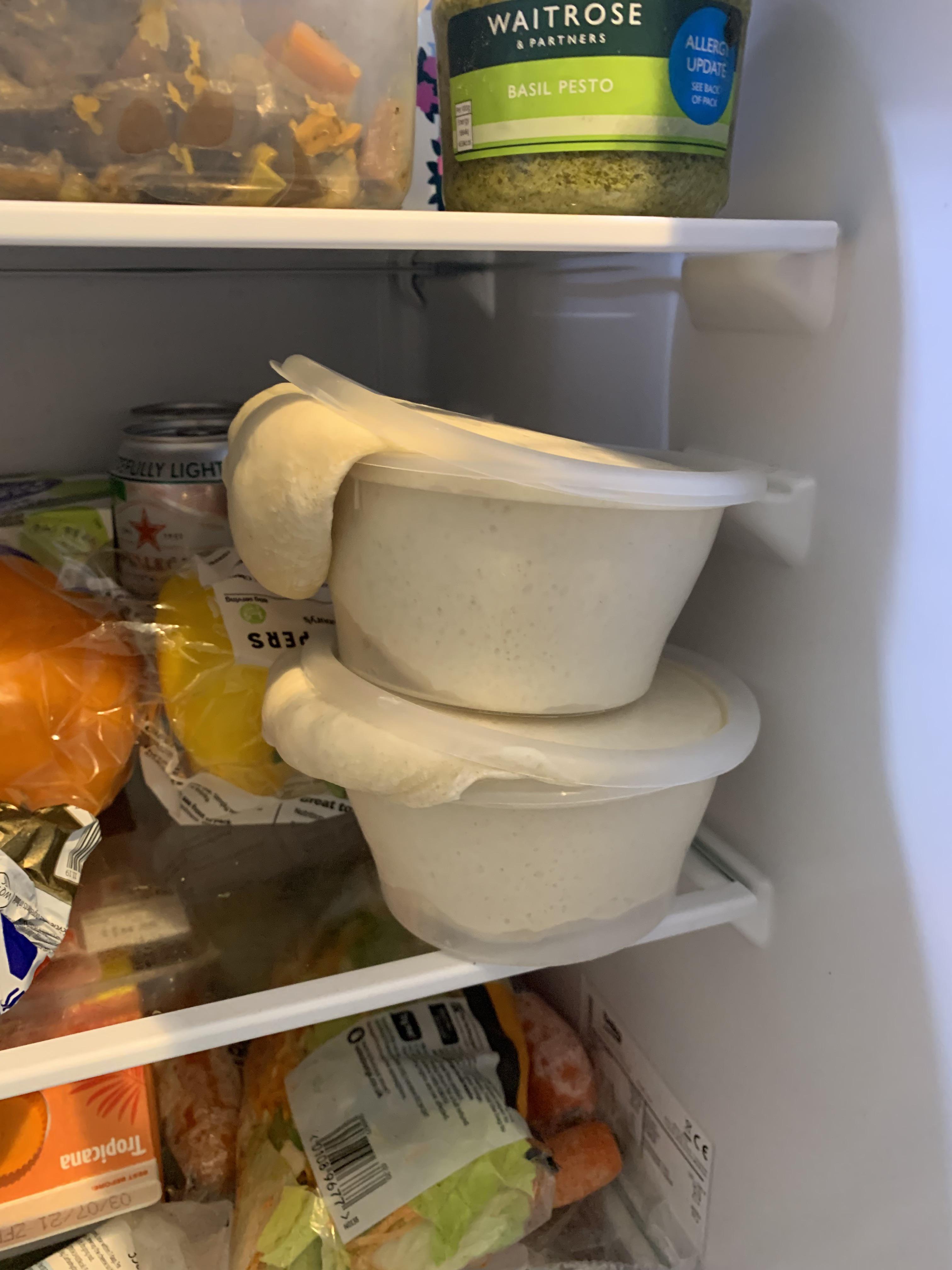 My pizza dough rose out of its container overnight in the fridge. r