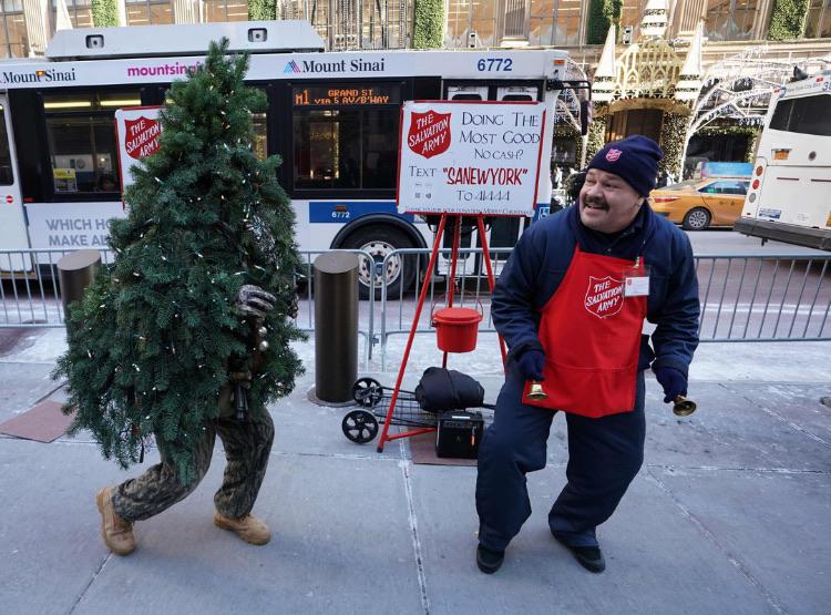 PsBattle This Salvation Army volunteer being chased by a Christmas