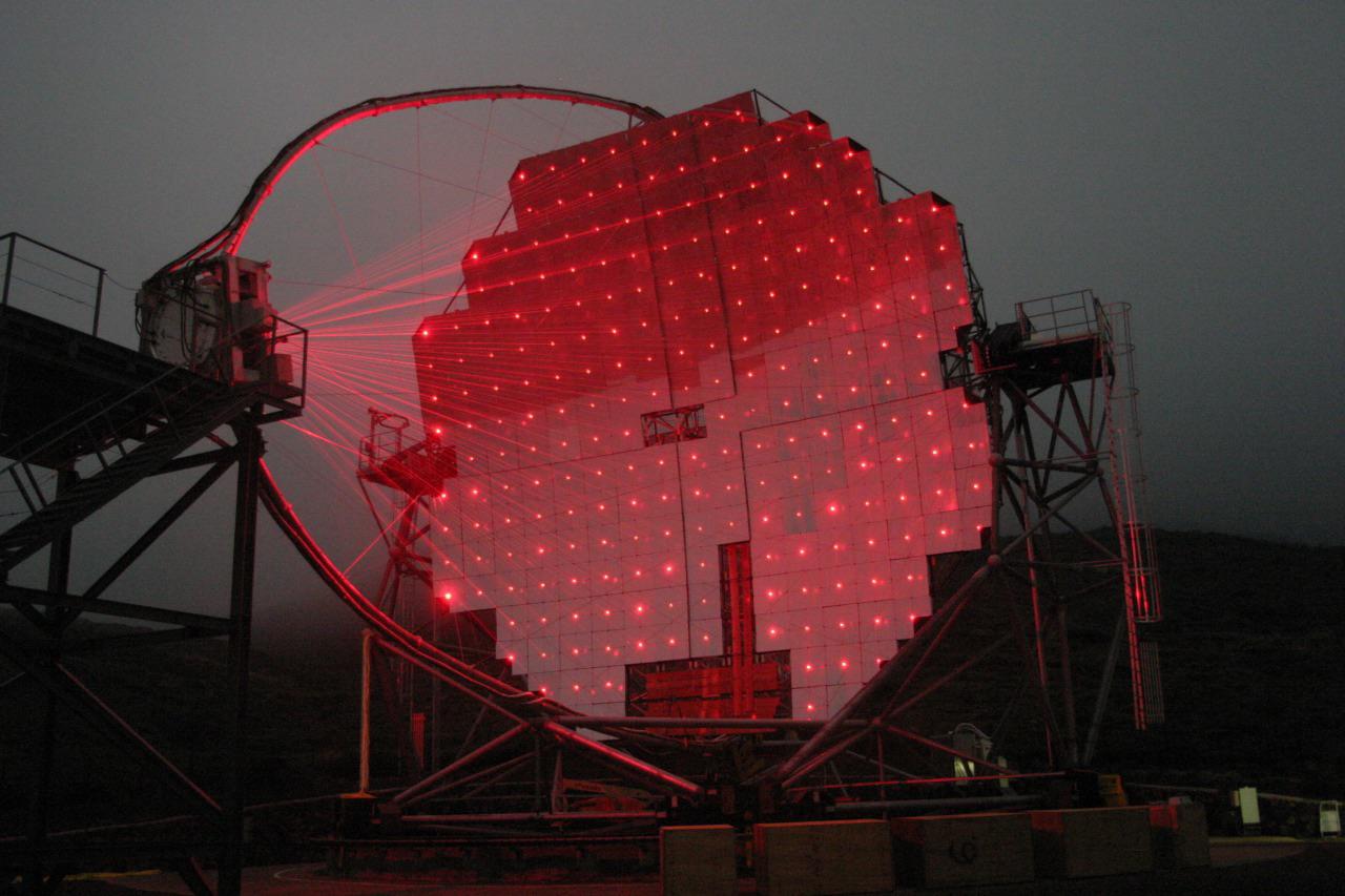 laser reference beams on the MAGIC telescope visible during