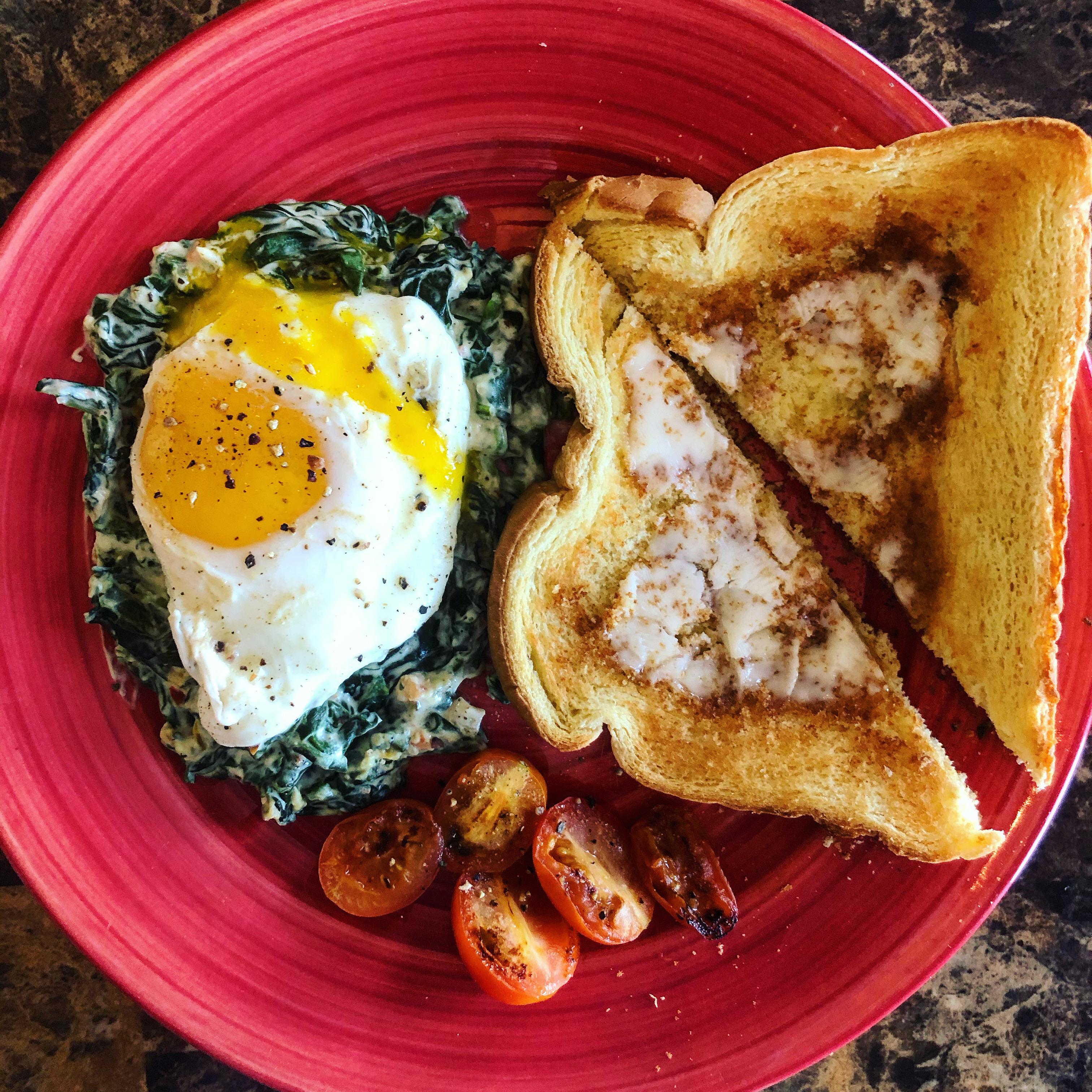 1950sStyle Brunch Creamy Spinach, Poached Egg, Tomatoes, and Toast