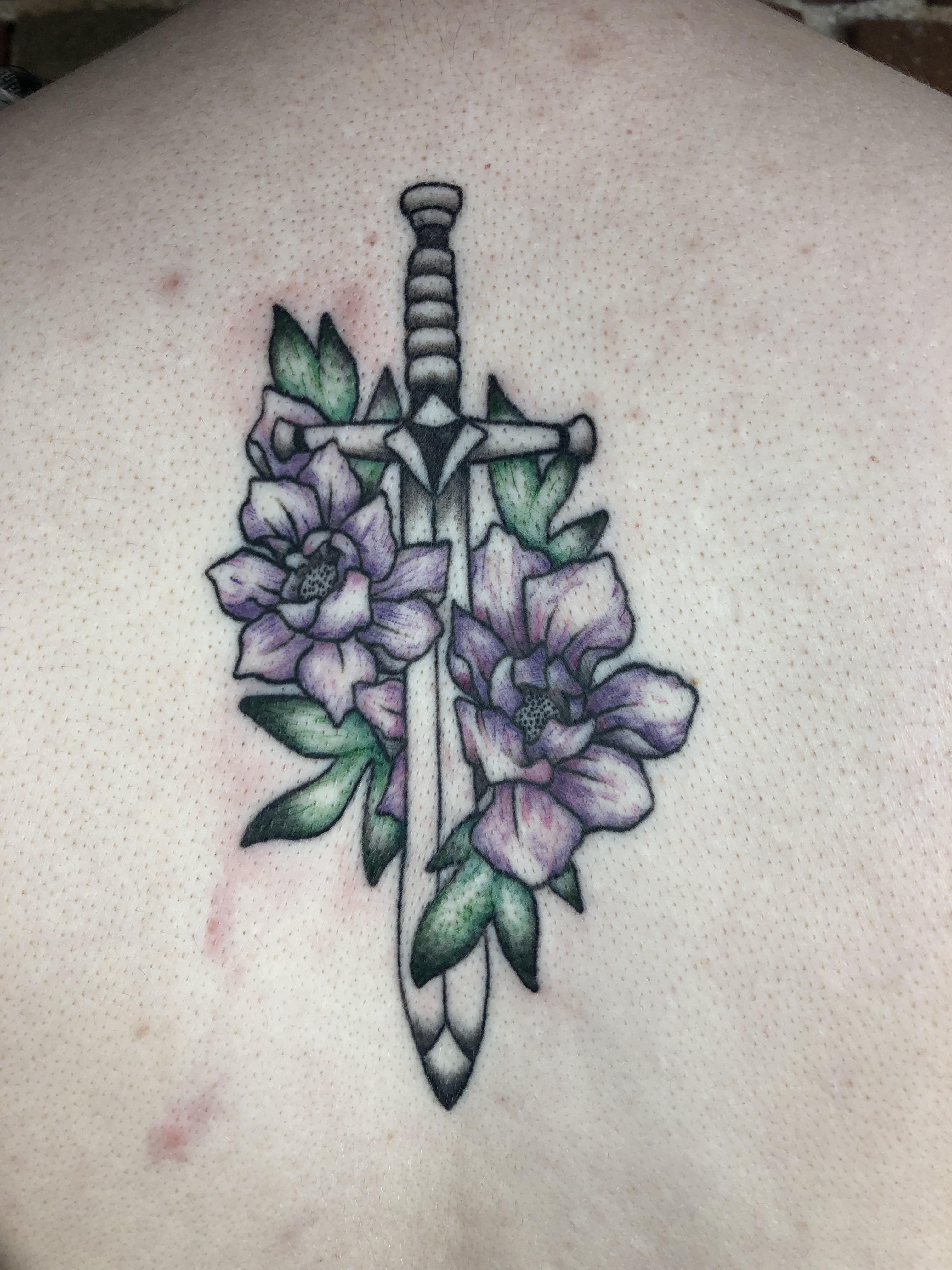 Dagger and flowers done by Kieffer at Bitterroot Tattoo, Moscow, ID. Just finished the leaves