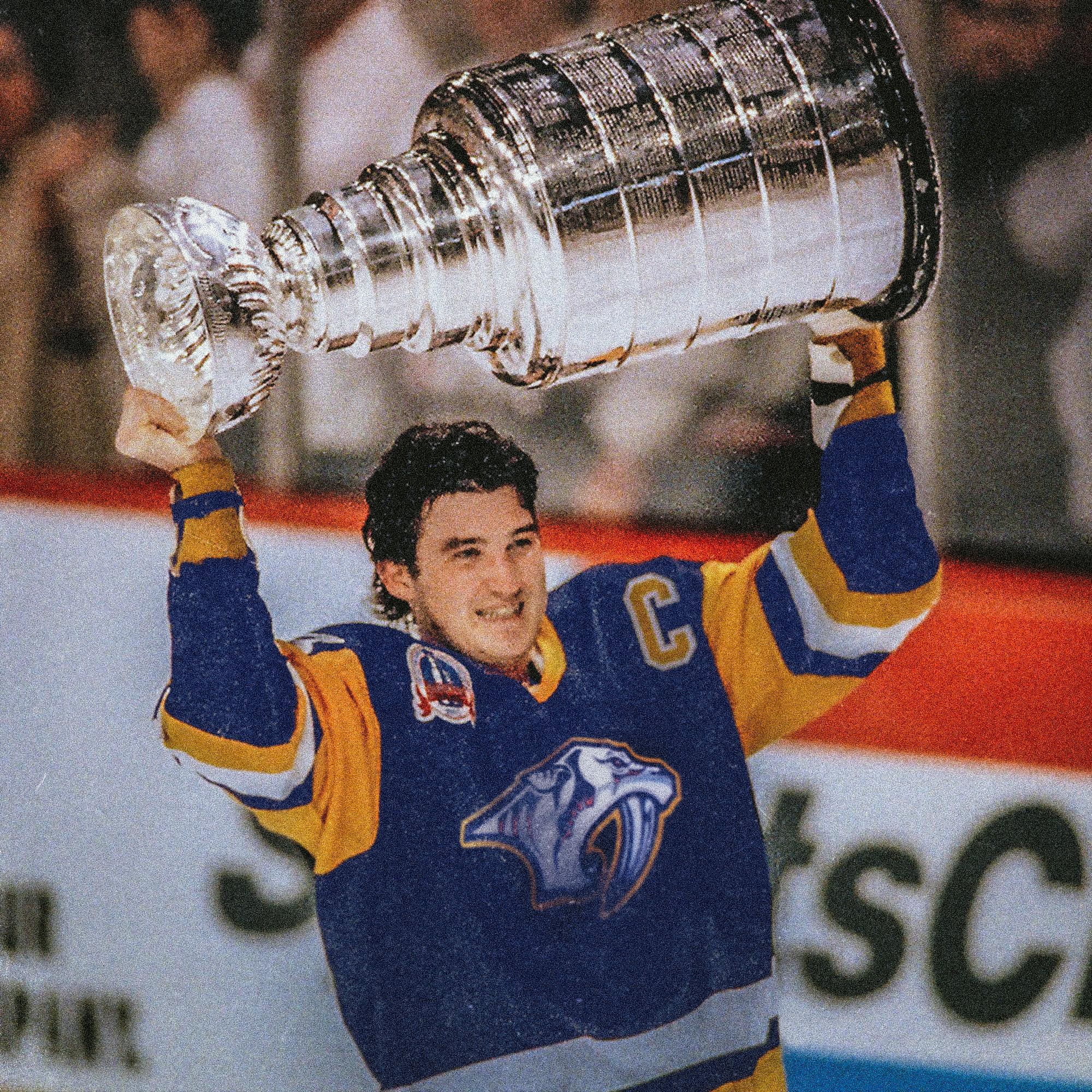 The Nashville Predators & Mario Lemieux celebrate their 1991 Stanley