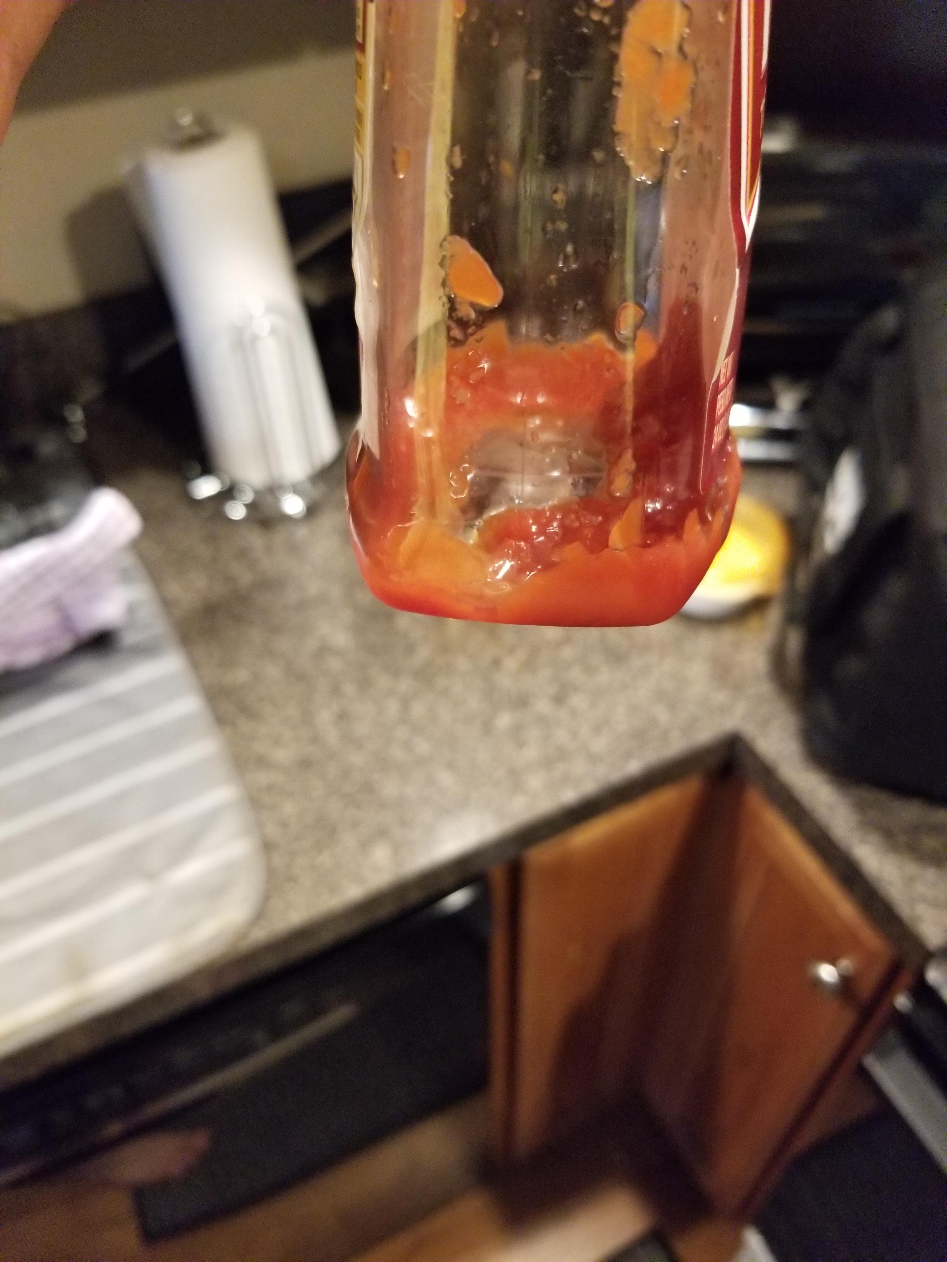 The amount of ketchup my girlfriend left in the fridge. r