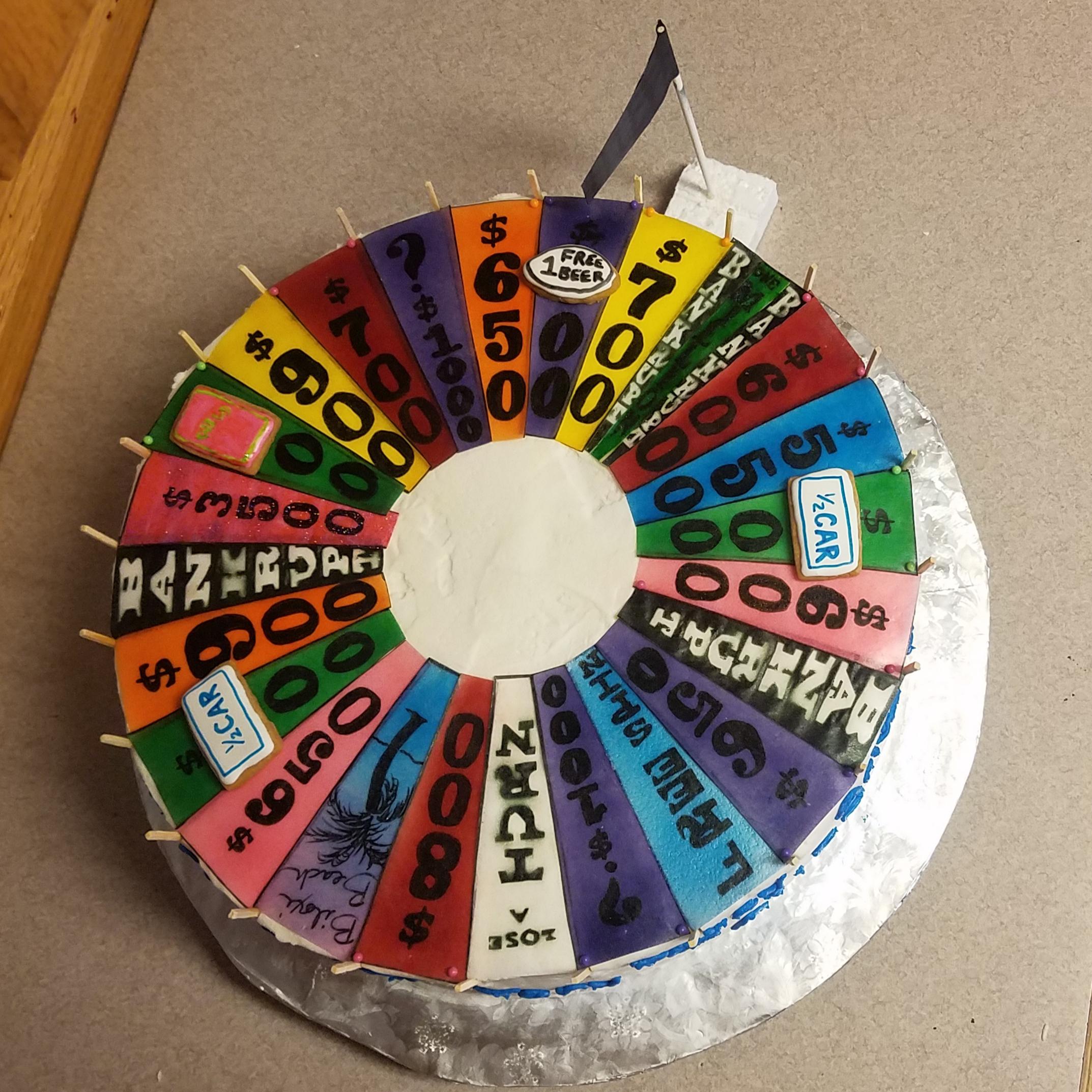 My wheel of fortune cake! All the wedges are airbrushed and/or