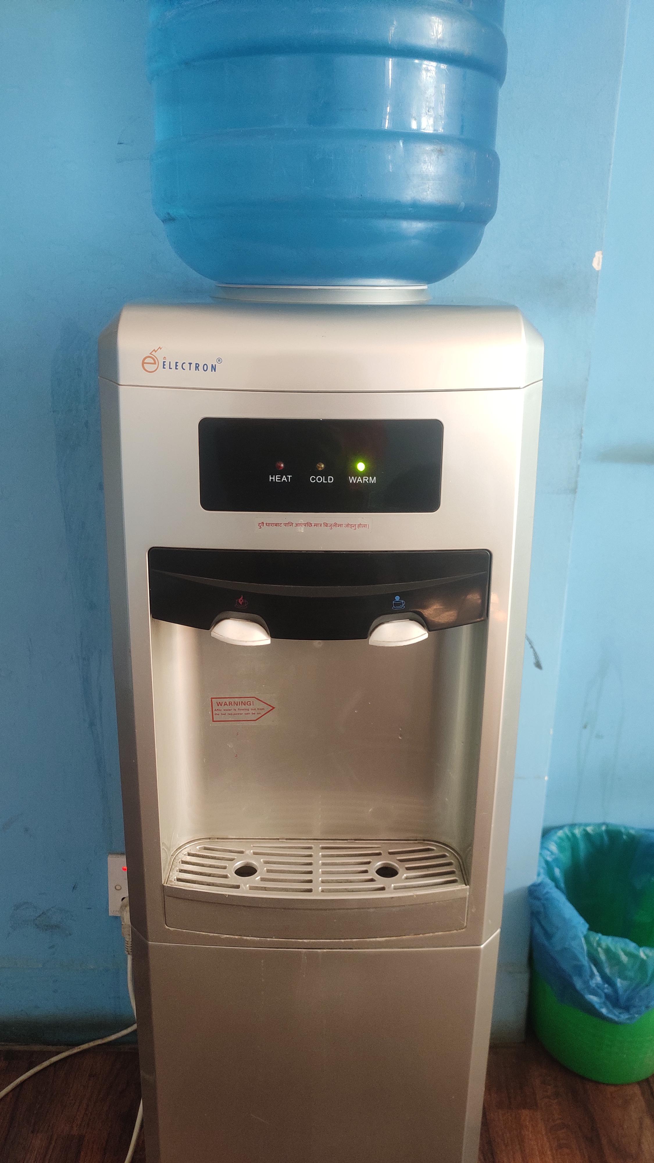 Think this belongs here😩Water dispenser in my office lits up warm on