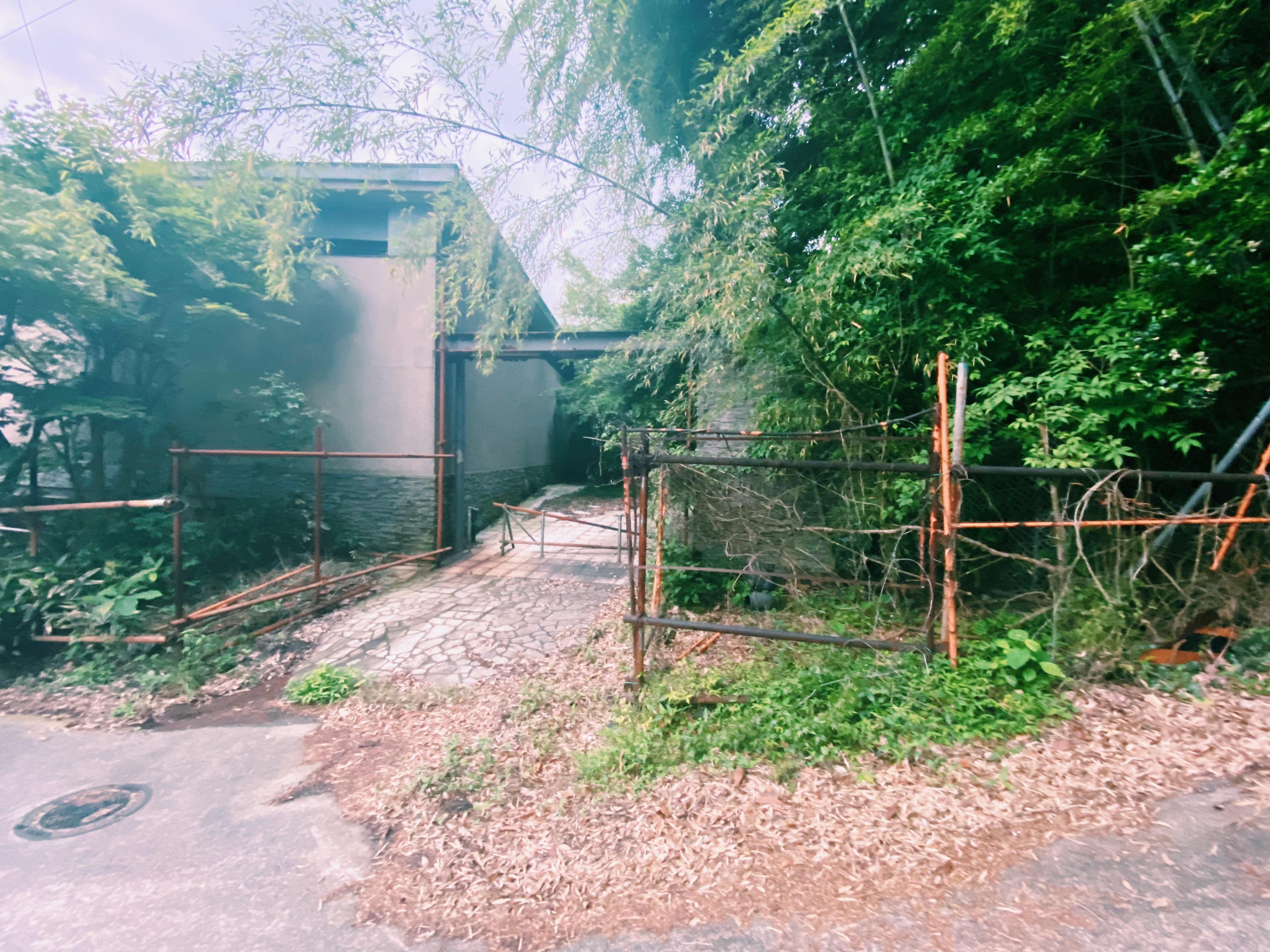 A modern day hotel in Japan. Closed off and in shambles. Complete with an abandoned murder