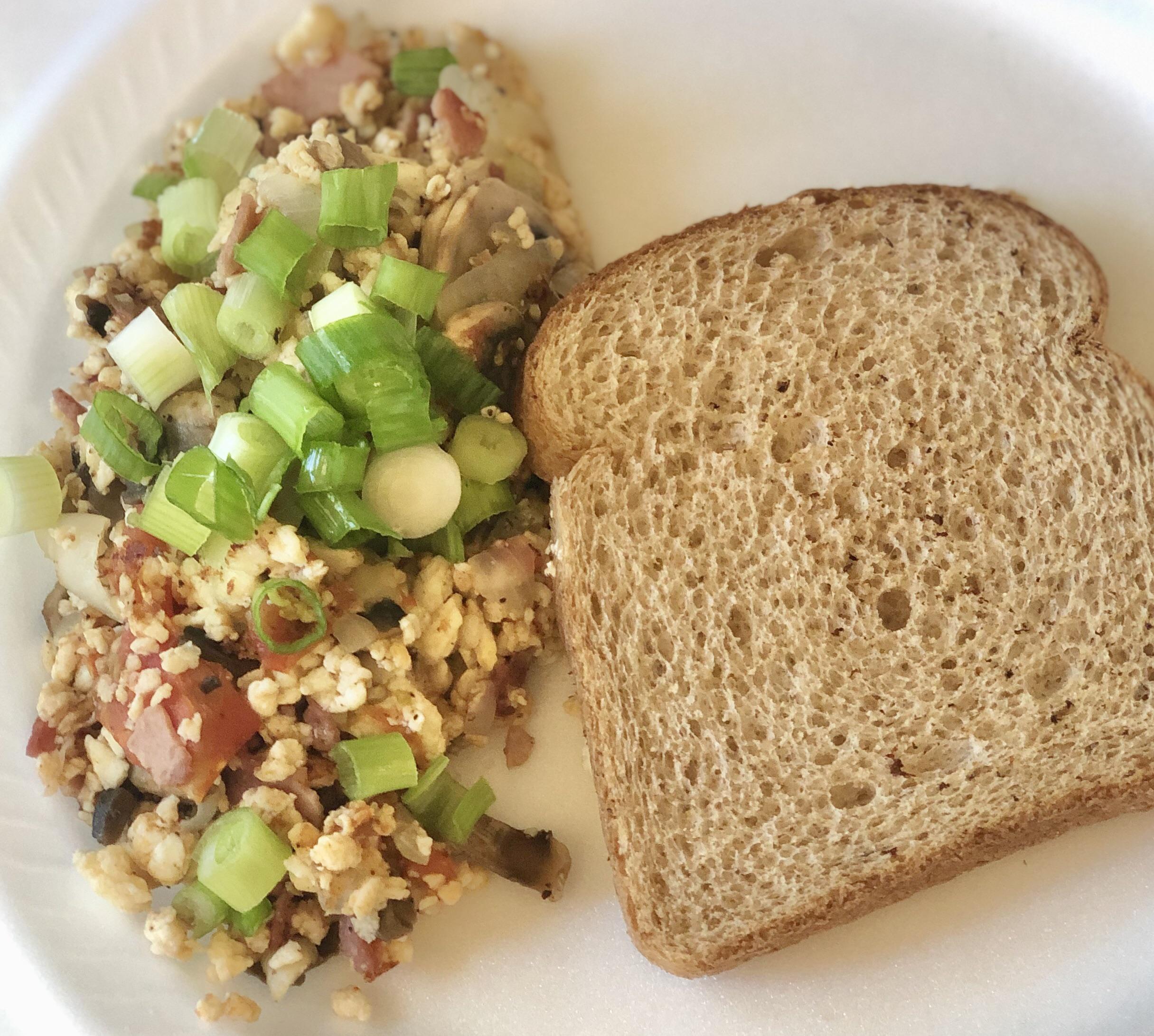 4 Egg white scramble w/ Turkey bacon, onion, tomato, mushroom, & topped