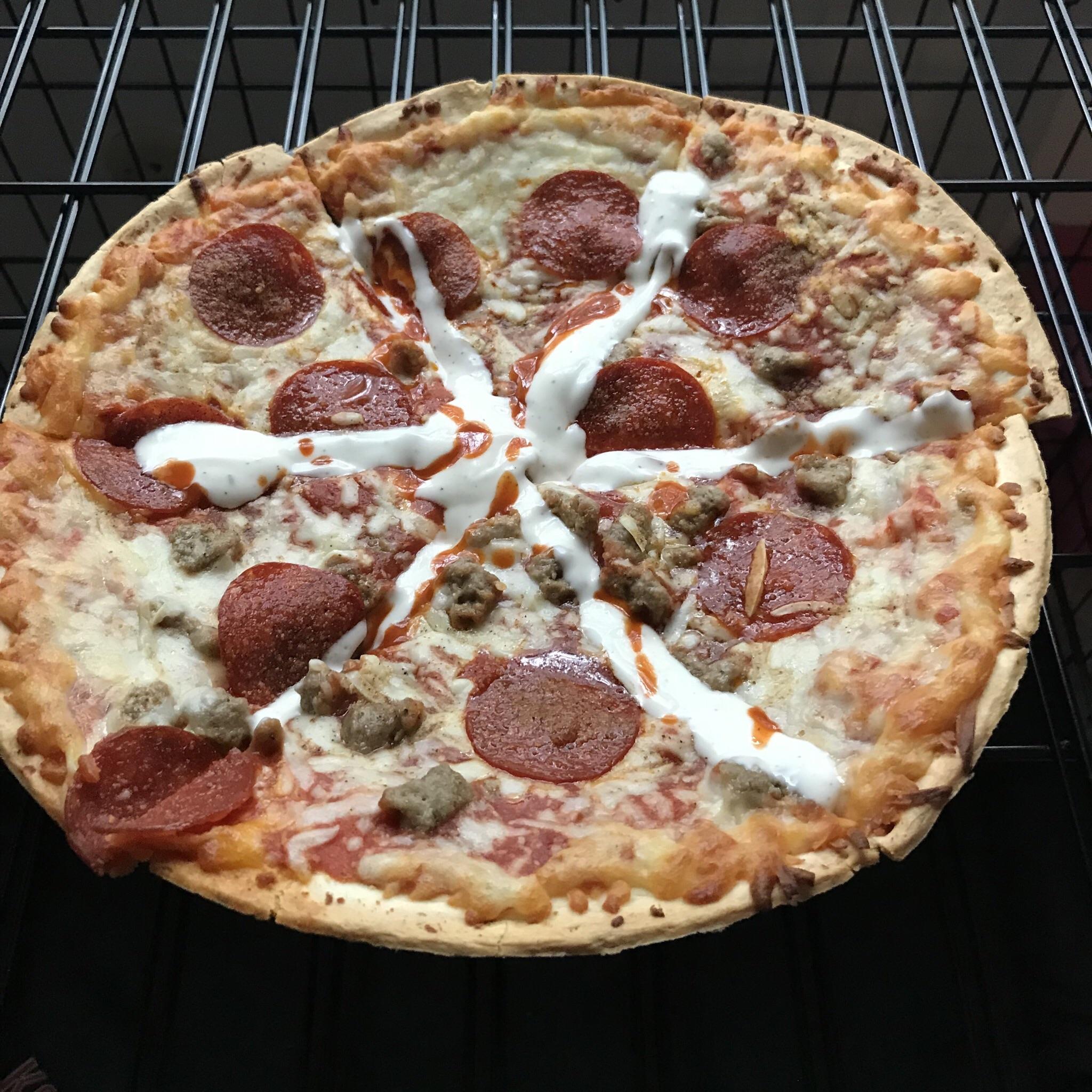 I am Jack's frozen pizza with ranch and Frank's hot sauce. r