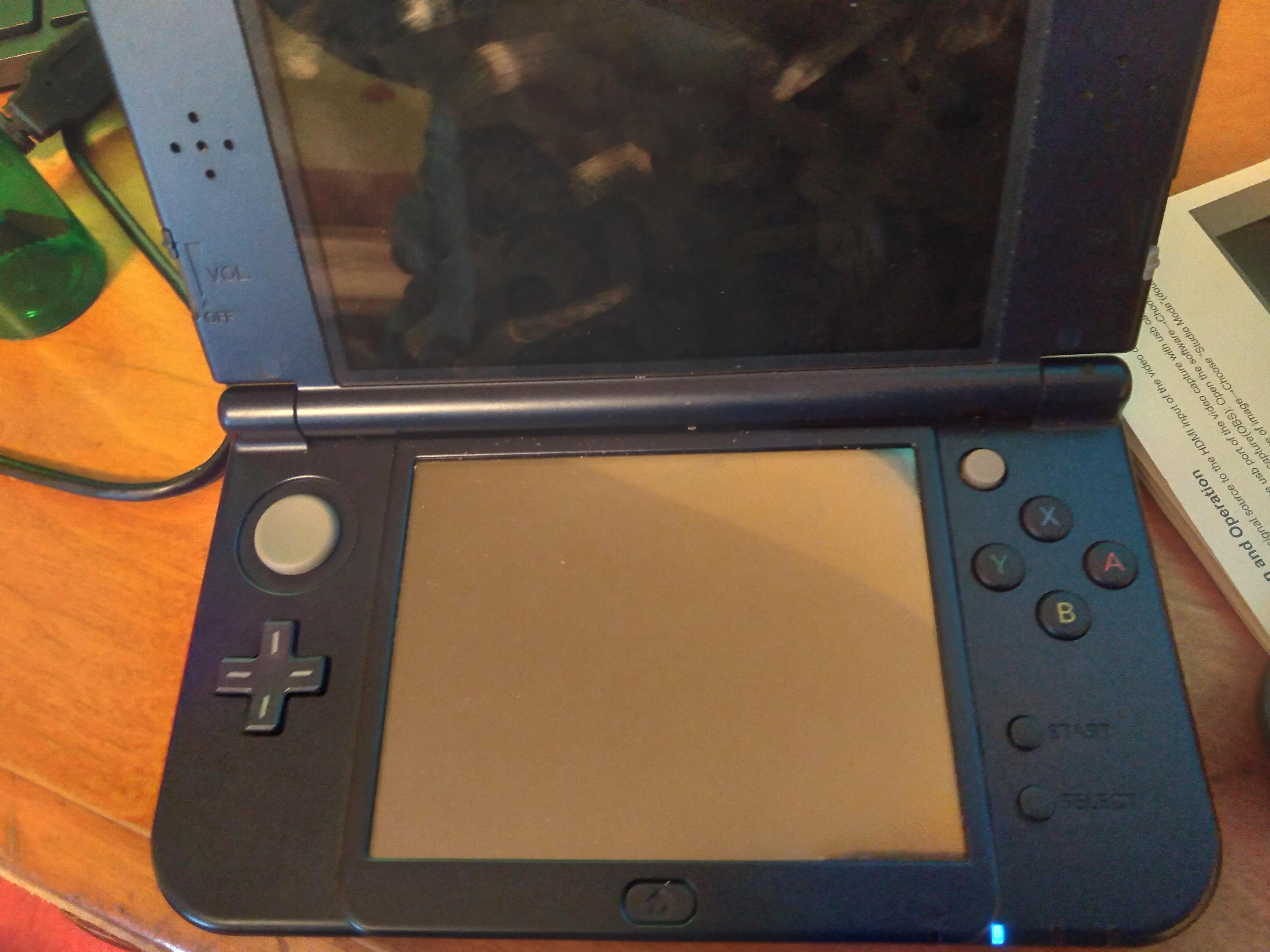 My 3DS has a blue light on but the screen wont turn on. Any ideas how