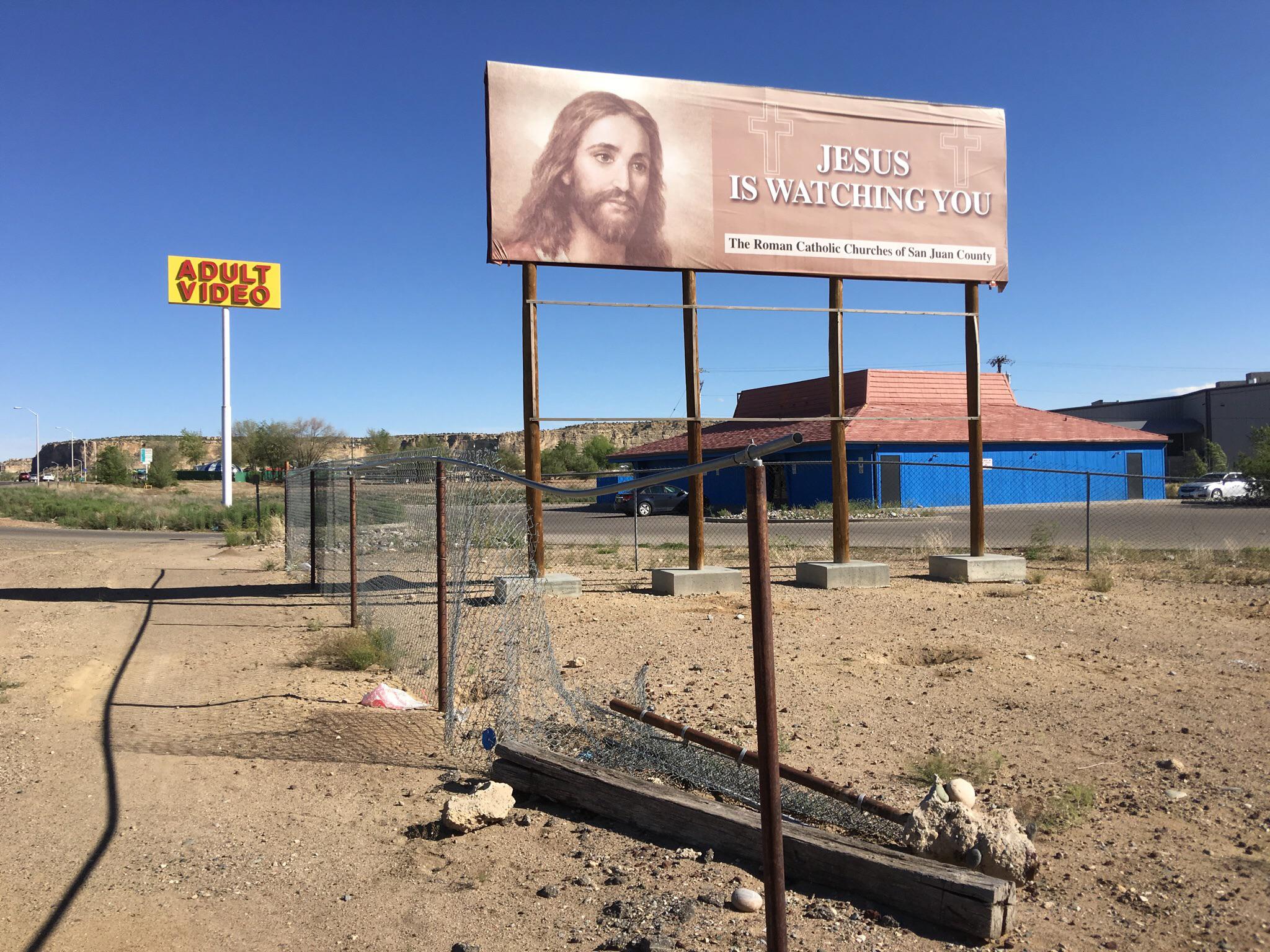 Here’s my pic of Jesus is Watching billboard with Adult Book Store