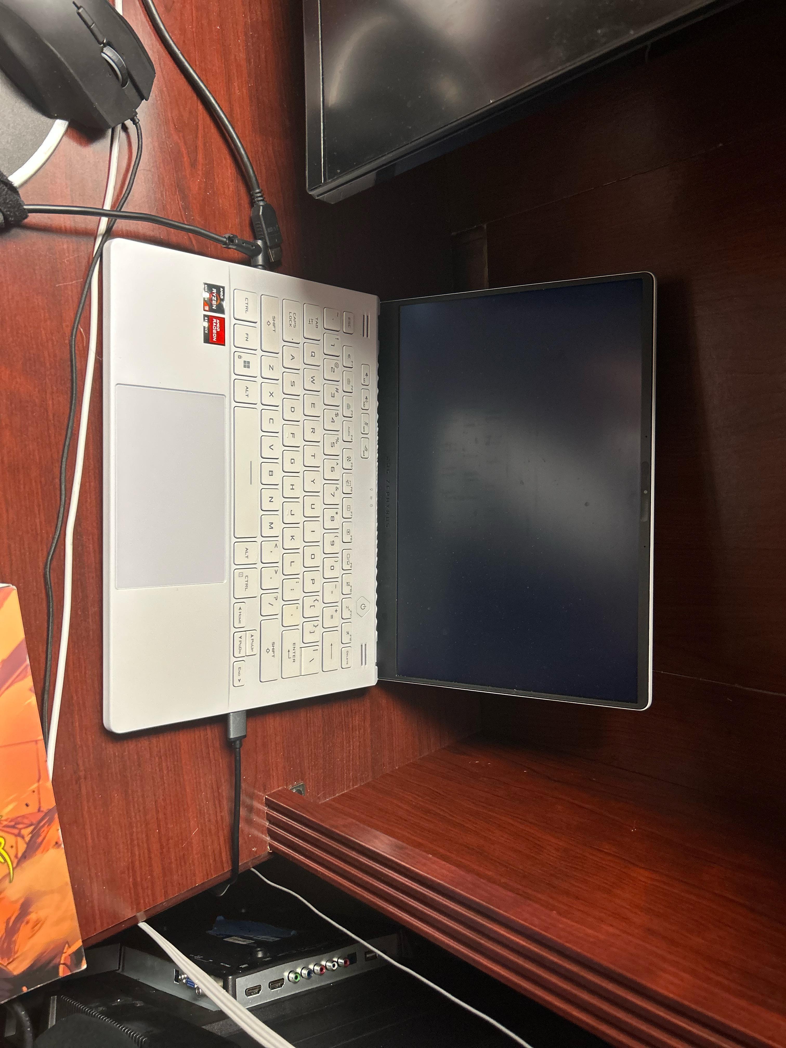 Had to turn off my laptop while bios was updating now stuck on a black