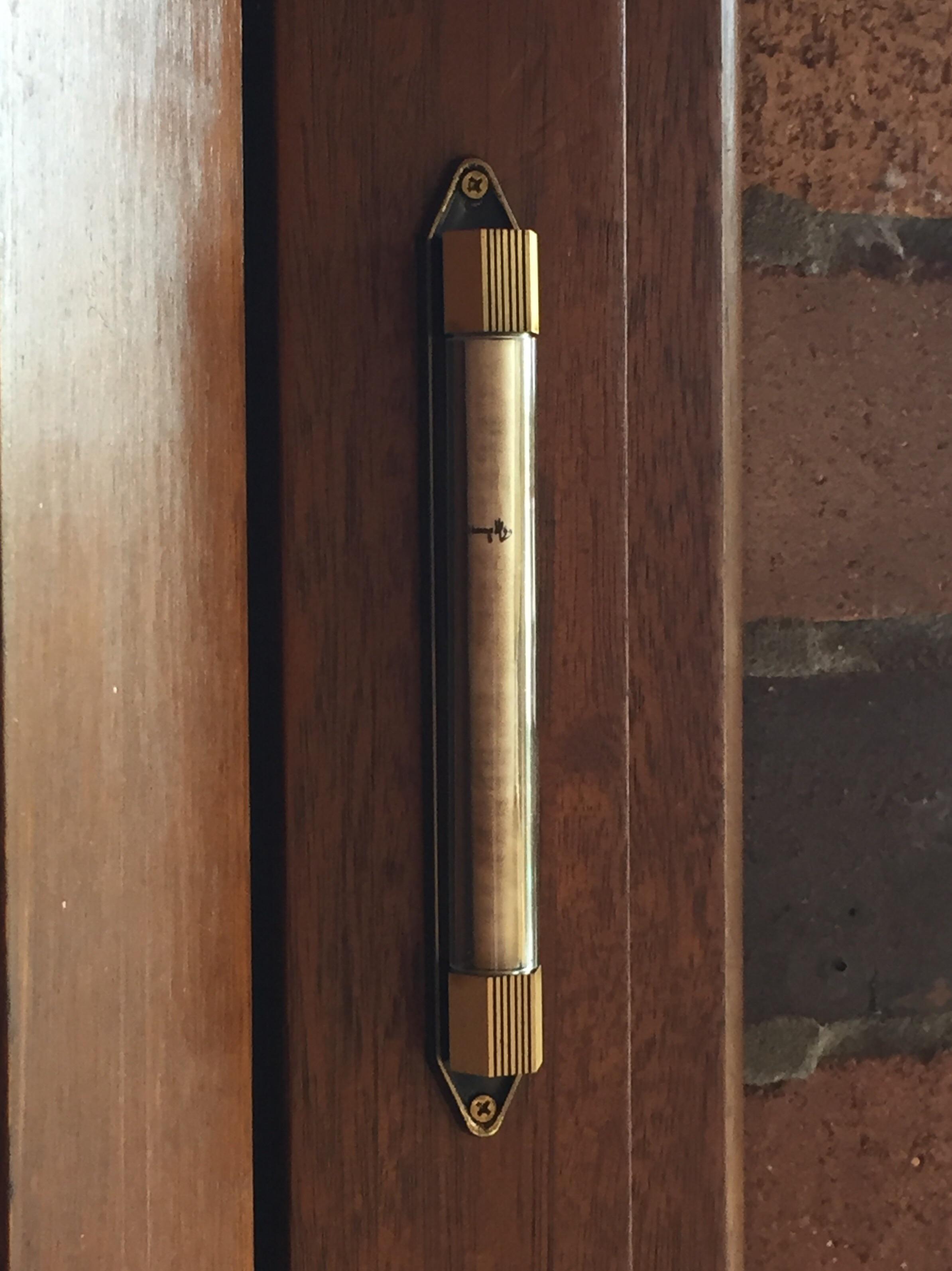 Old ugly mezuzah was missing the scroll, so I got a new one along with