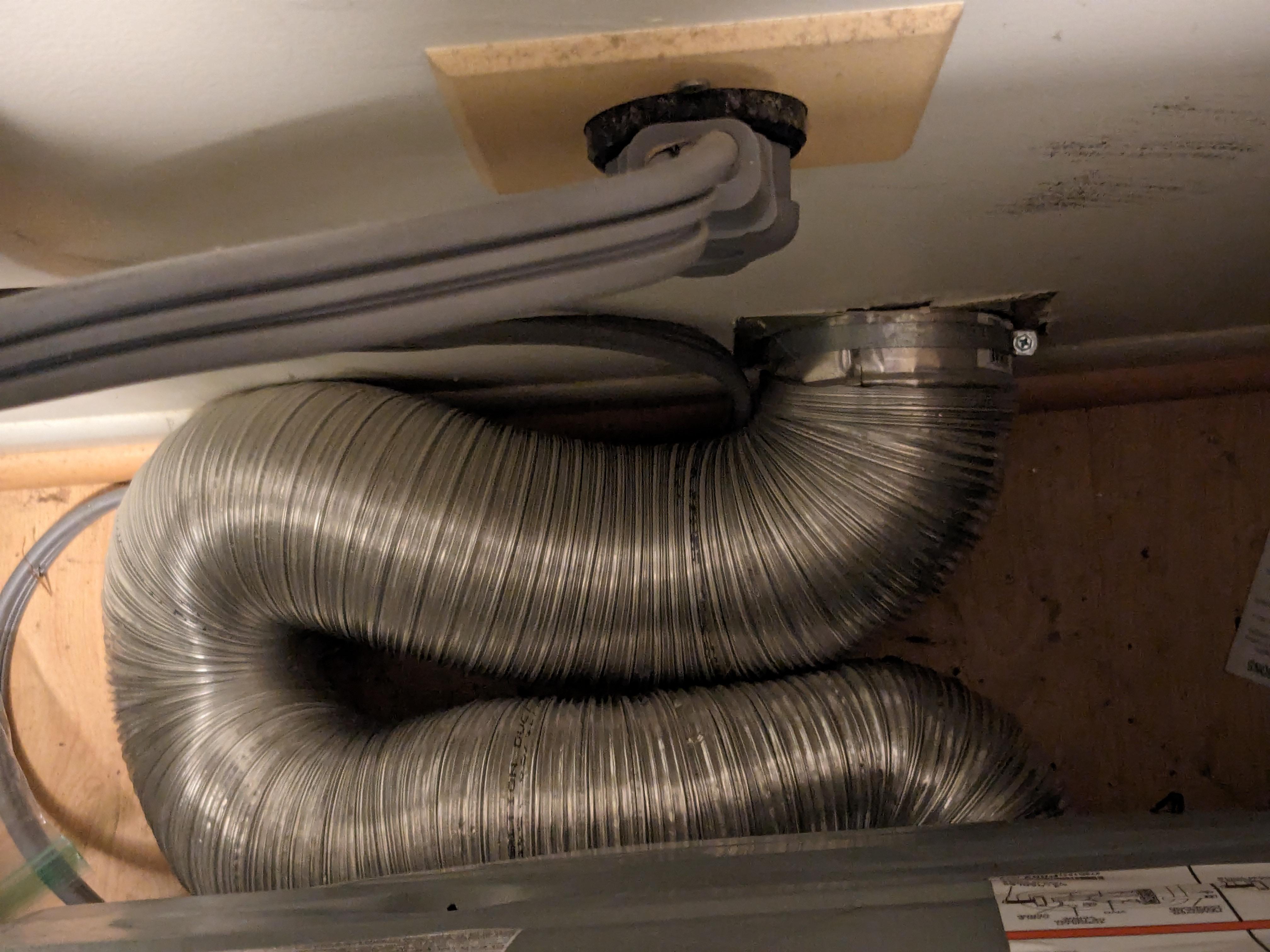 How can I improve this dryer exhaust? The other side of this wall is