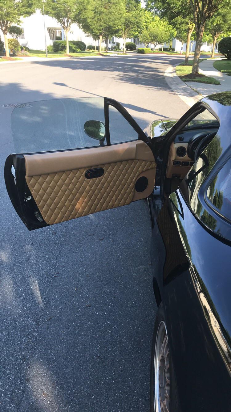 Made myself some quilted leather door panels! 30 fabric and some spray