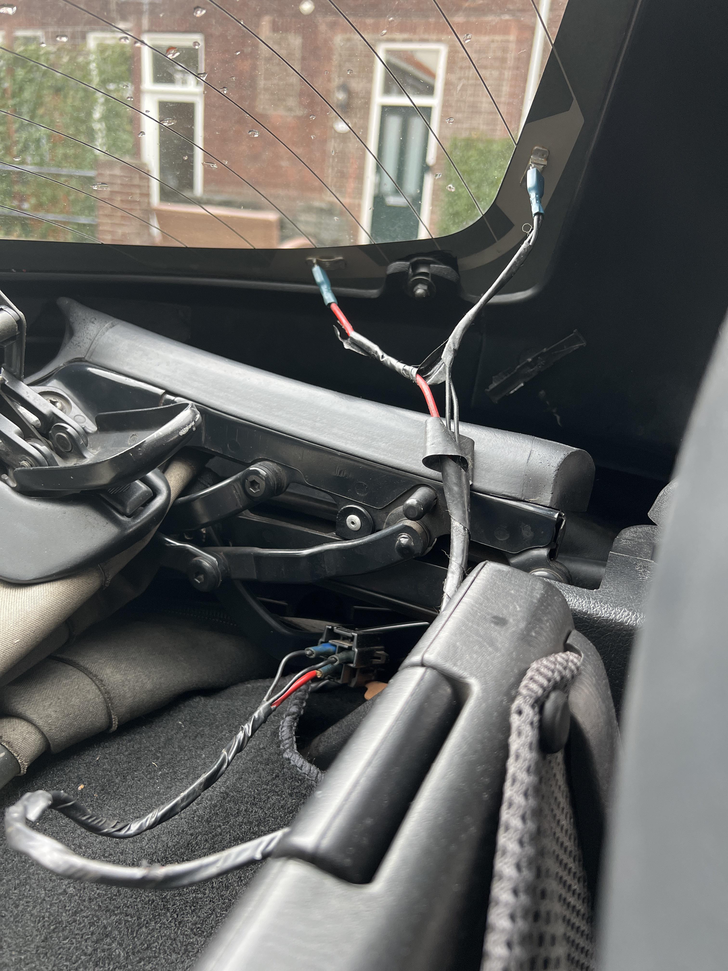 My miata only came with this cable for the hardtop defroster, what goes